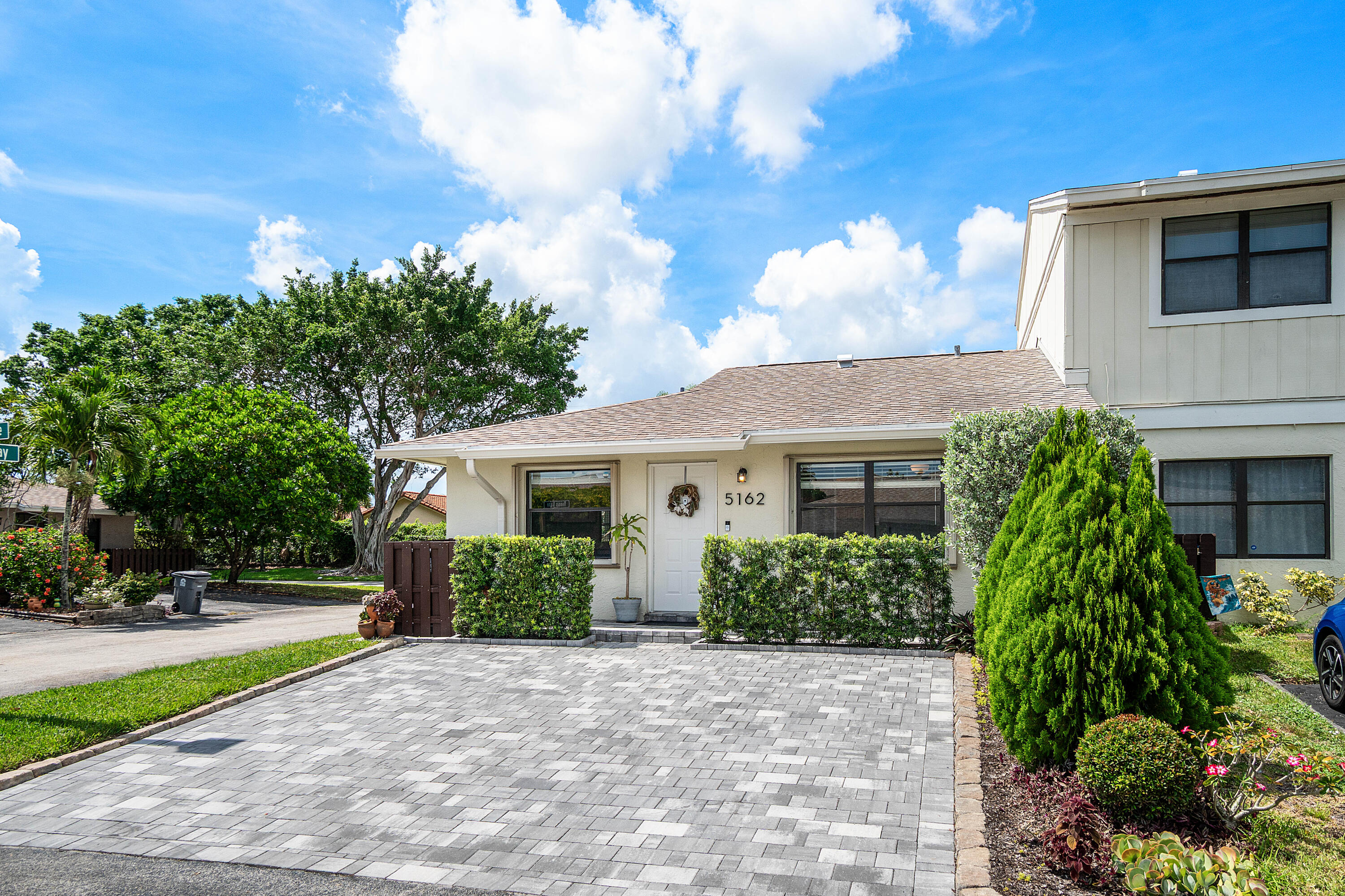 Welcome to this fully renovated 2 bed, 2 bath, one story, corner villa with NEW KITCHEN, NEW BATHROOMS, NEW PAINT, ALL TILE FLOORING, AND 2021 ROOF. This turn-key home features a gourmet kitchen with quartz counters and stainless steel appliances. The spacious primary suite has a large walk-in closet and modern shower with mosaic tile. This meticulously maintained home has a 2 car paver parking pad and private backyard with screened in porch perfect for hosting friends and family. Experience luxury living in this gated community located close to I-95, the beach, shopping, & dining. Schedule your showing today.