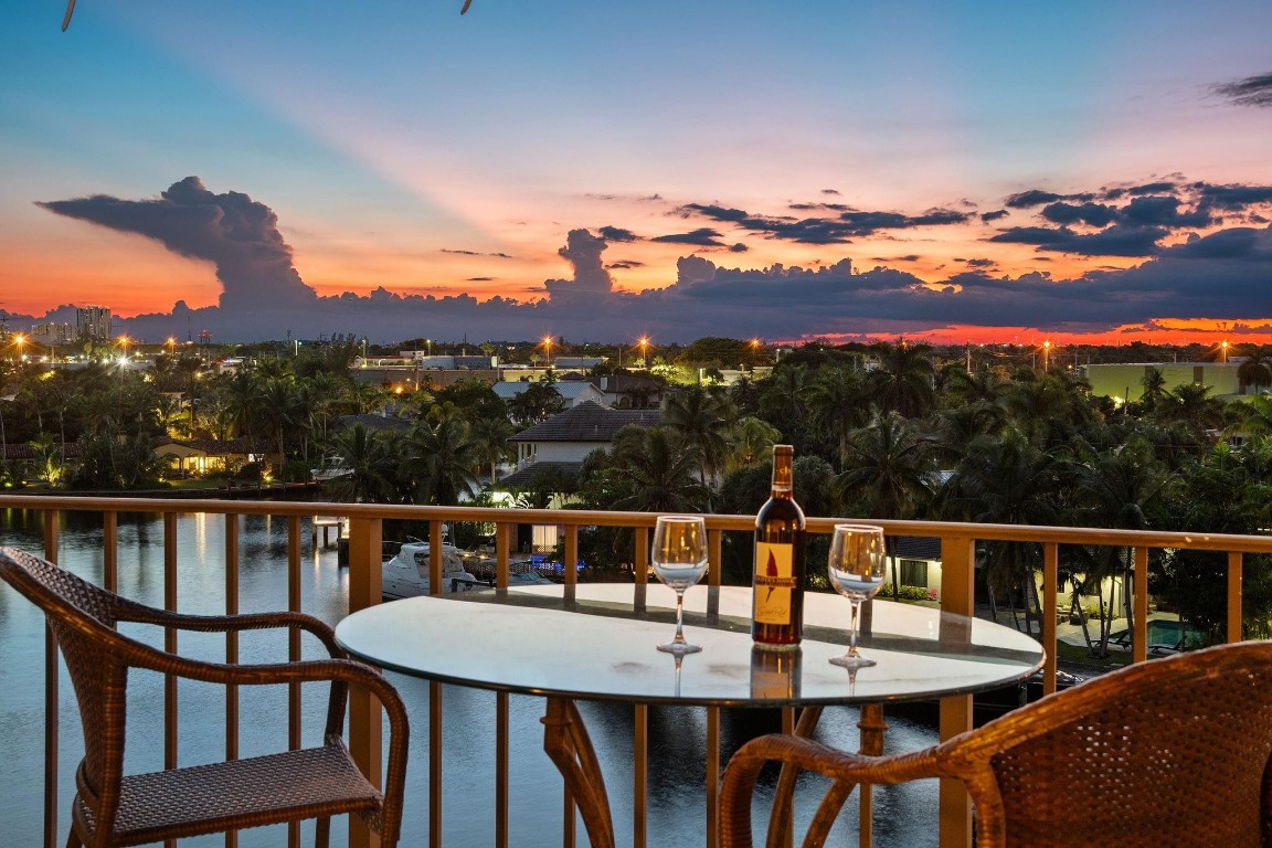 Million-Dollar Views for only $475K! Experience laid back luxury at its best in this exceptional 2/2 unit with breathtaking unobstructed views of downtown Fort Lauderdale & the shimmering Middle River. Positioned in the premier location in the building, this top floor corner unit offers exceptional privacy & abundant natural light in an exclusive 5-story boutique building located in Coral Ridge. Features include remodeled kitchen & baths, new plumbing throughout in 2025, new AC in 2022, tankless water heater, impact windows, and a private balcony perfect for enjoying sunrise coffee or the glittering city skyline by night. Enjoy South Florida by relaxing at the tropical pool right on the River. Located in the Bayview School District minutes from the beach, airport, fine dining, & shopping.