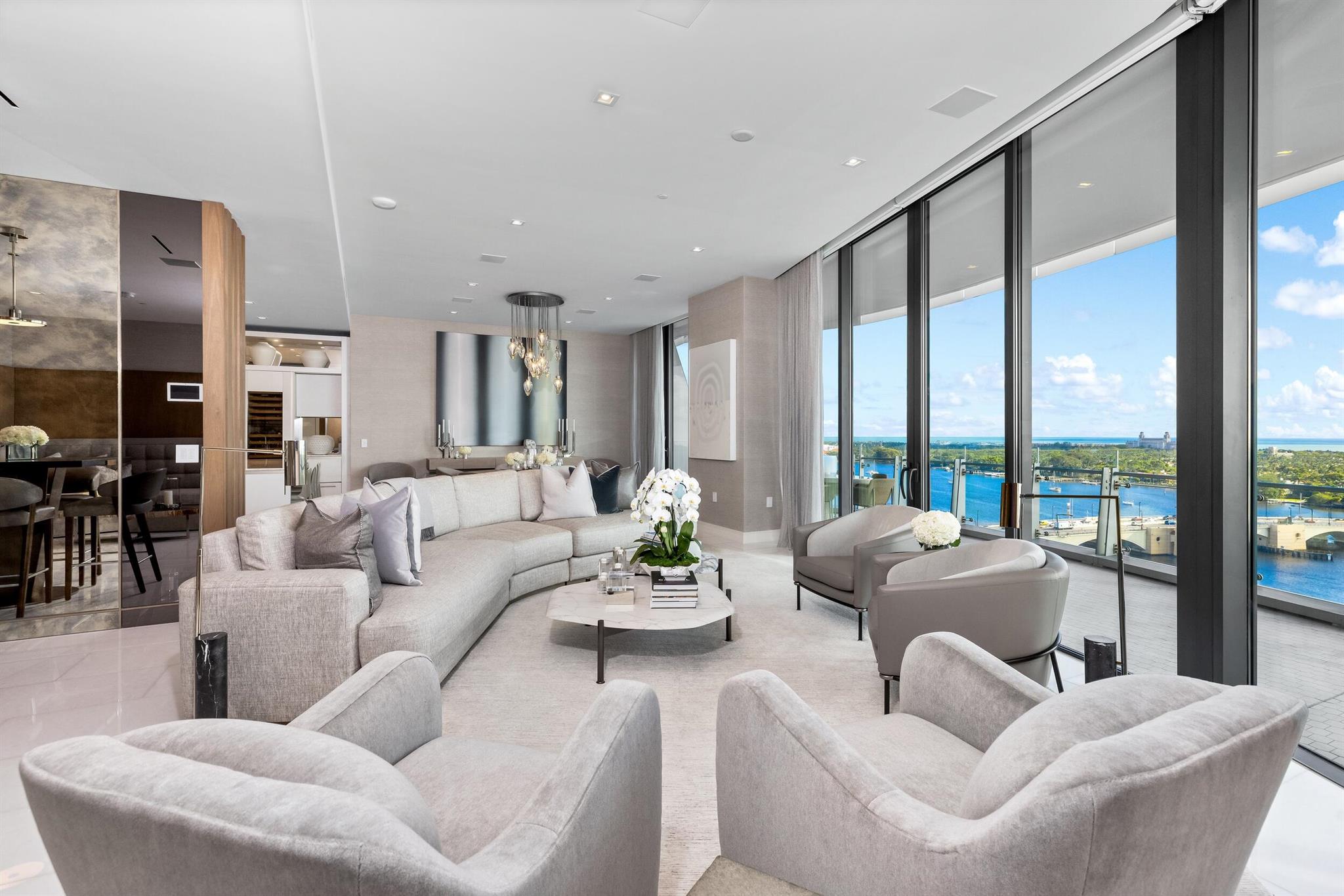 Gorgeous condominium with 3BR/4.1BA plus library, 4,300+/- total square feet, and beautiful views of the Intracoastal, Ocean, and Palm Beach Marina. Stunning custom design by Marc-Michaels Interior Design. Welcoming foyer leads to large great room and family room with water views. State-of-the-art gourmet kitchen features Calcutta countertops, Snaidero cabinetry, and Gaggenau appliances. Spacious waterfront Primary Suite with dual baths and three walk-in closets opens to oversized balcony. Two guest suites feature en-suites, walk-in closets, and fantastic city views. Additional highlights include soaring ceilings, floor-to-ceiling impact doors, and an expansive covered balcony that is perfect for al fresco dining and entertaining. No detail has been overlooked in this pristine condo. The Bristol features excellent amenities including a beauty salon, fitness center overlooking the Intracoastal, two spas, pool and jacuzzi, entertainment terrace, lounge, valet, concierge, and more.