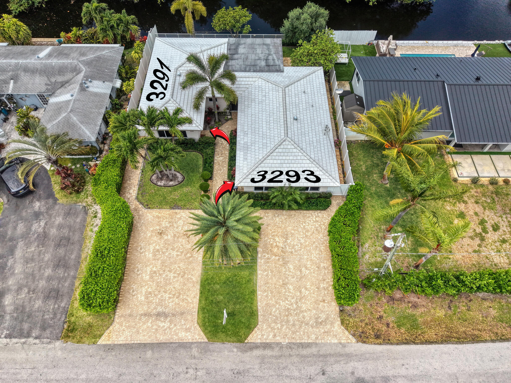 This rare waterfront duplex features two separate units, each with 2 bedrooms and 2 bathrooms, all in impeccable condition. Both units were completely renovated by the owner, including the driveway. The roof is only 6 years old. Both units have central A/C, and all windows and doors are impact-rated. Offering lifestyle and investment potential, each unit boasts spacious interiors, natural light, and well-designed layouts. Enjoy canal views and a peaceful outdoor setting, minutes from the beach, shopping, and dining. A rare, versatile opportunity in a highly desirable area. All information is deemed reliable but not guaranteed and should be independently verified.