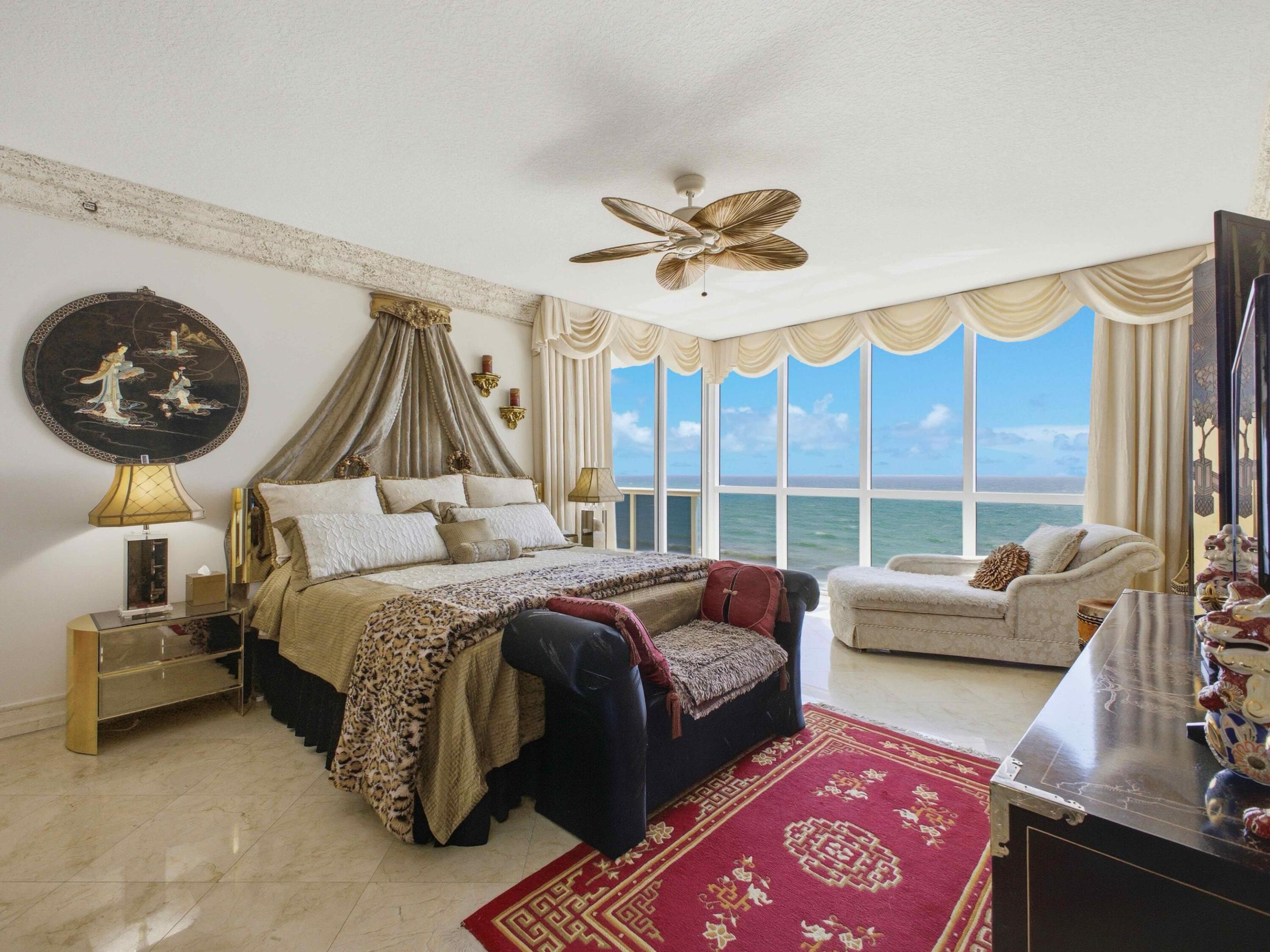 Experience luxury beachfront living in this stunning 3-bedroom, 3-bath residence with breathtaking direct ocean views. A private elevator opens into your own foyer, leading to a spacious split-bedroom floor plan. Enjoy sunrise mornings from the expansive oceanfront balcony, while the second balcony showcases beautiful city skyline and nighttime views. The oversized primary suite features separate his-and-her bathrooms and a large walk-in closet. Elegant marble flooring and crown molding flow throughout the home. Resort-style amenities include tennis courts, sauna, fitness center, beach cabanas, poolside café, 24-hour security, and concierge services. Ideally located directly on the sand and minutes from shopping, dining, entertainment, and major highways.