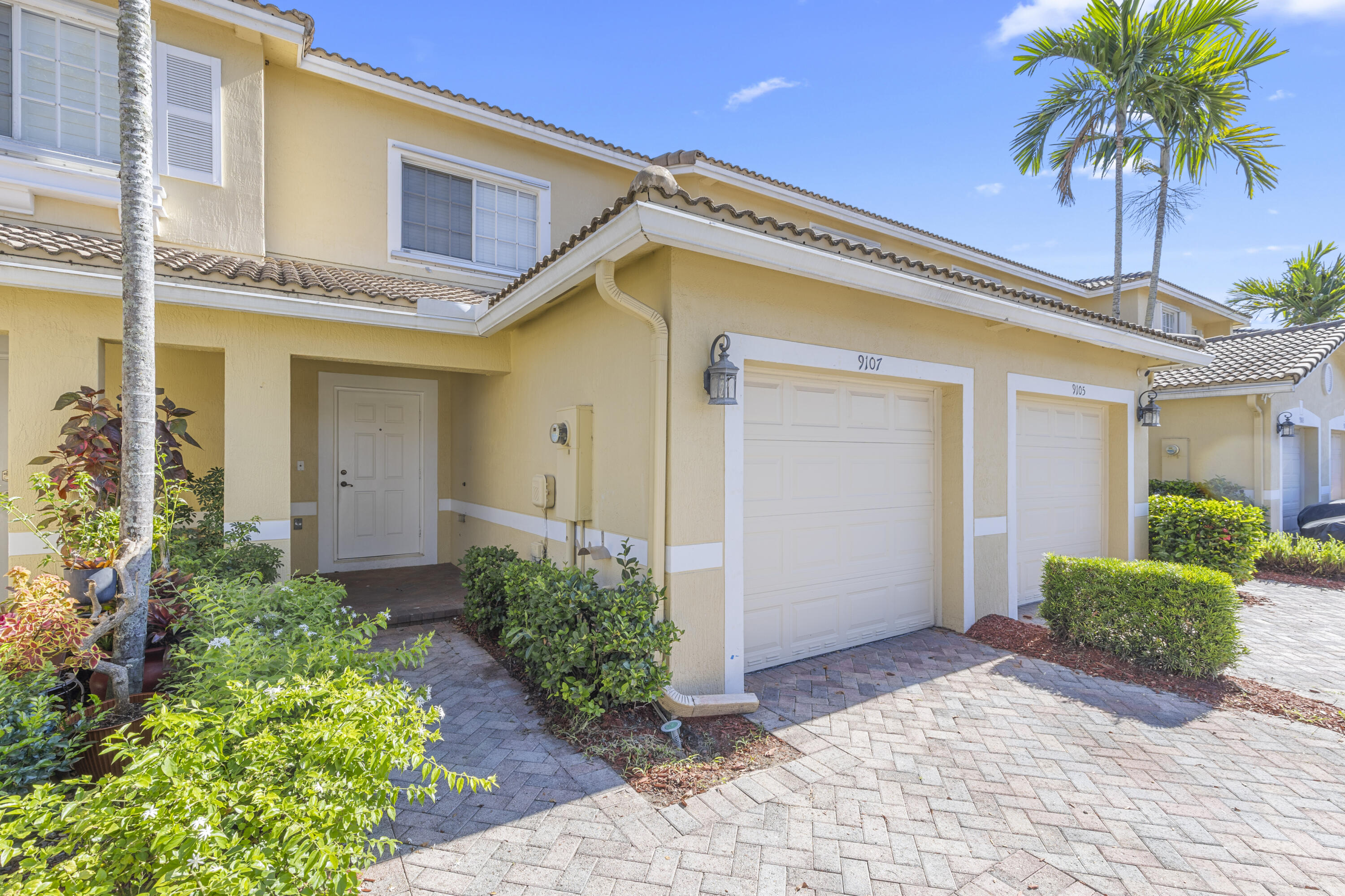 Beautiful and spacious 2-bedroom, 2.5-bath townhouse with a 1-car garage, located in the desirable gated community of Hampton Hills in Tamarac. This well-kept home features granite countertops, stainless steel appliances, and a functional breakfast bar. The main living areas offer tile flooring, while the bedrooms and staircase showcase wood floors for added warmth. The unit also includes a washer and dryer for added convenience. Residents enjoy access to a heated pool, clubhouse, fitness center, playground, and secure gated entry.