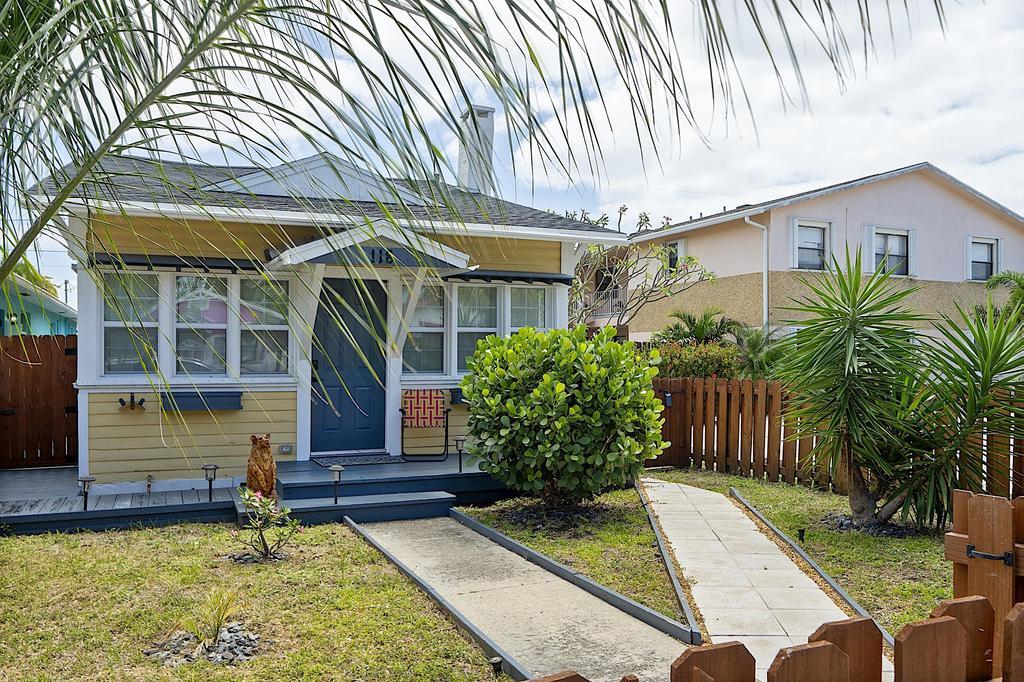 Cute as button 2 bedroom 1 bath bungalow in heart of Lake Worth Beach. Recently remodeled with open floor plan, modern kitchen, new bathroom, tankless gas water heater, low-E windows and washer and dryer. Re-roof completed in 2022. Wonderful front porch and back patio, with a fenced-in yard. Situated in the Southeast Lucerne Historic District with Multifamily (MF-30) zoning that allows for another residence to be built on property. The possibilities here are endless. Concepts of shipping container ADU have been previously reviewed by Historic Preservation. Home is less then 2 blocks from restaurants, bars, shopping and just over the bridge to the beach.