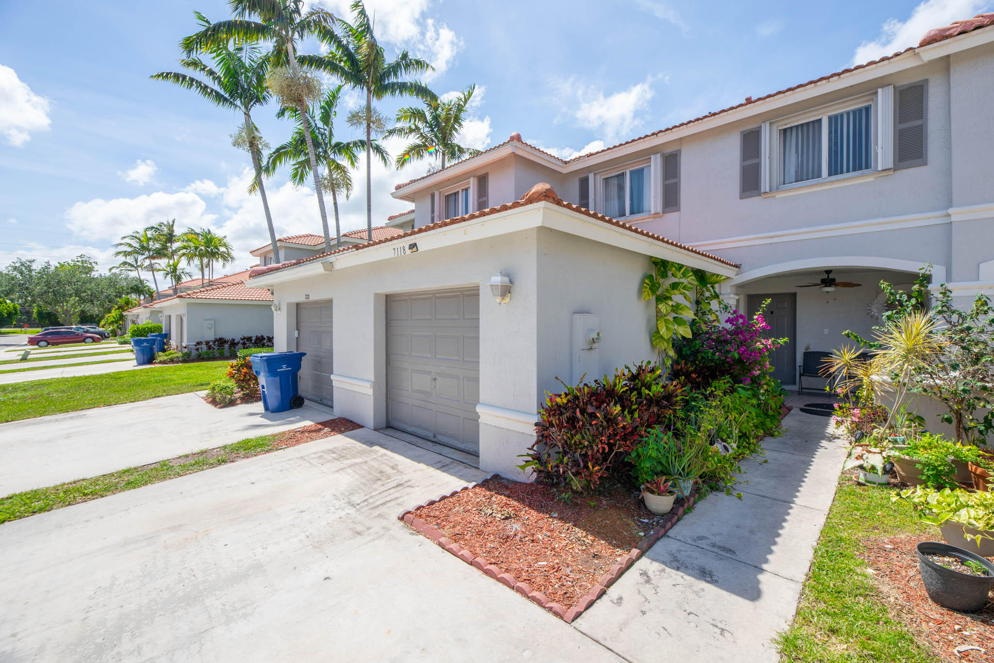Beautiful and spacious 3-bedroom, 2.5-bath townhome with a 1-car garage, nestled within the desirable gated community of Turtle Cay. This well-maintained home features tile and luxury vinyl flooring throughout, updated bathrooms, and elegant modern chandeliers in the living room and stairway. The light-filled great room flows seamlessly into the kitchen, complete with stainless-steel appliances and a convenient pass-through bar—perfect for entertaining family and friends. Relax on the screened patio overlooking peaceful, tree-lined views.  Residents enjoy resort-style amenities, including a swimming pool, tennis courts, volleyball court, fitness center, clubhouse, and playground. Ideally located near premier shopping, dining, and entertainment, Turtle Cay is just minutes from the Ballpark of the Palm Beaches, Rapids Water Park, The Gardens Mall, Palm Beach Outlets, beautiful beaches, and provides easy access to I-95 and Florida's Turnpike