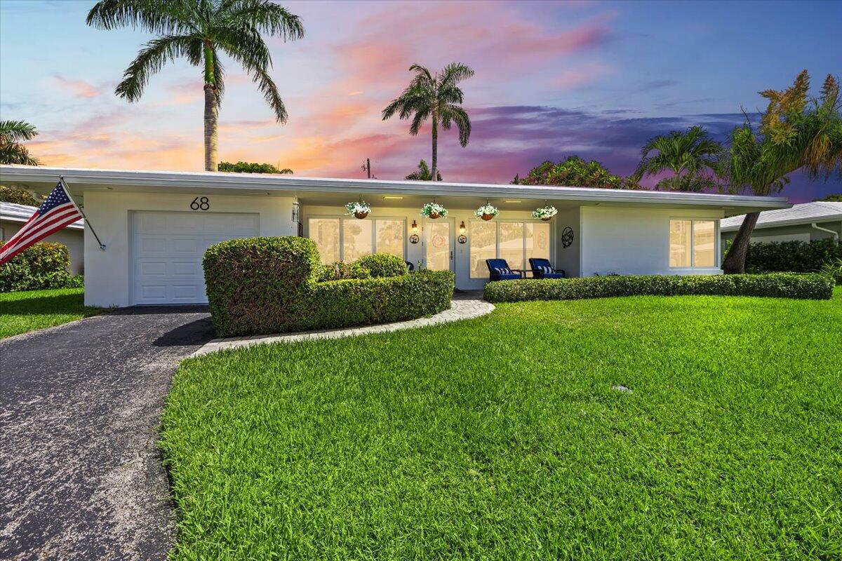 Welcome to paradise at Palm Yacht & Beach Club, a 55+ Co-Op on 27 acres- one of Broward's best managed co-ops. No expense was spared in this completely renovated home offering 2,000+sf w/ 2 bedrooms both with en-suite baths. The gorgeous kitchen features custom cabinetry plus marble countertops and backsplash.  Porcelain tile throughout the home w/ no steps inside. From the bright & airy Florida room, step out the private and lush backyard with huge paver patio.  The marina has 16-slips with Intracoastal access, an updated clubhouse across the street with kitchen, heated pool, and 100' private Atlantic Ocean beach. The fulltime staff maintains roof, lawn, sprinklers, home painting, pressure cleaning, trash, Master/Flood Insurance Policy (saving you almost $16k annually!) and so much more!