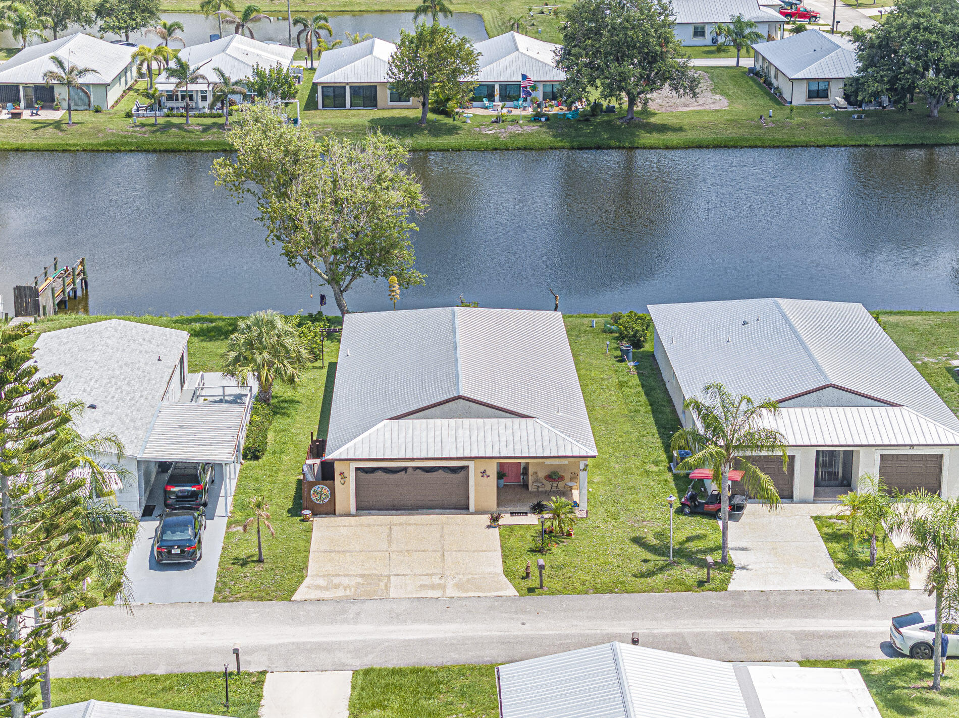 Located in the desirable Spanish Lakes community, this beautifully built 4-year-old concrete block home offers quality construction and modern design. Featuring spacious open living areas, a two-car garage, and abundant natural light, this home is perfect for comfortable living and entertaining. Enjoy serene lake views in a vibrant golf course community with exceptional amenities, including clubhouse, pool, fitness center, and more. Resort-style living at its finest!