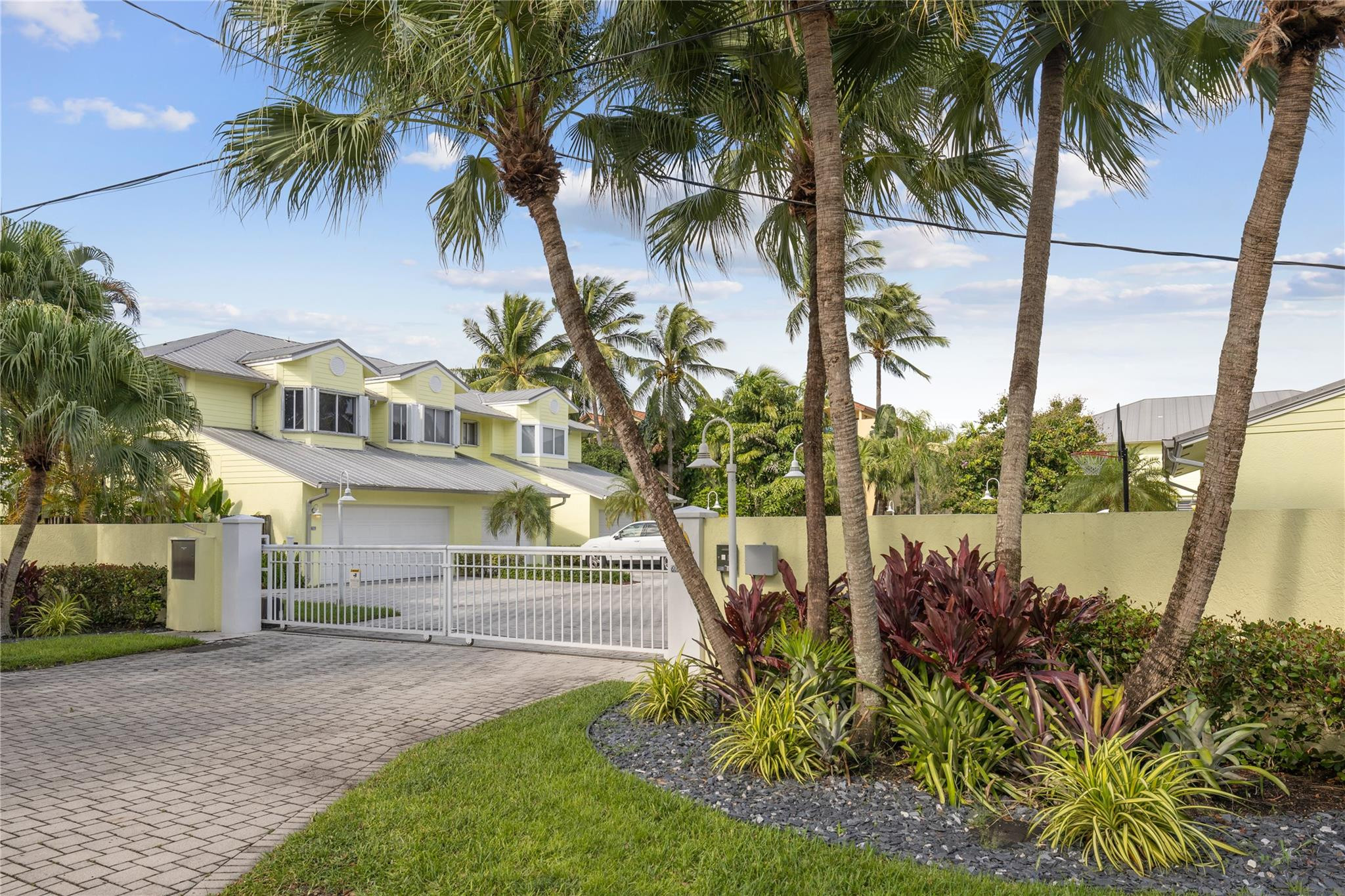 Welcome to your Downtown Dream Home! This beautiful townhome is a rare find located in the trendy Tarpon River neighborhood on the New River.  You will be walking distance to Las Olas featuring great restaurants, ports, and beaches while being tucked away from its hustle and bustle. This boutique, gated development has rare intercostal dock access, tennis + pickle ball court, and large pool. Once inside the home you will be greeted with a modern, open floor plan that has ample entertaining space. Impact windows and doors throughout. HOA includes all exterior insurance, roof and exterior maintenance, common area landscaping, pool, tennis court, water, sewer & trash removal. Don't miss your chance to own this beautiful home in the heart of Fort Lauderdale.