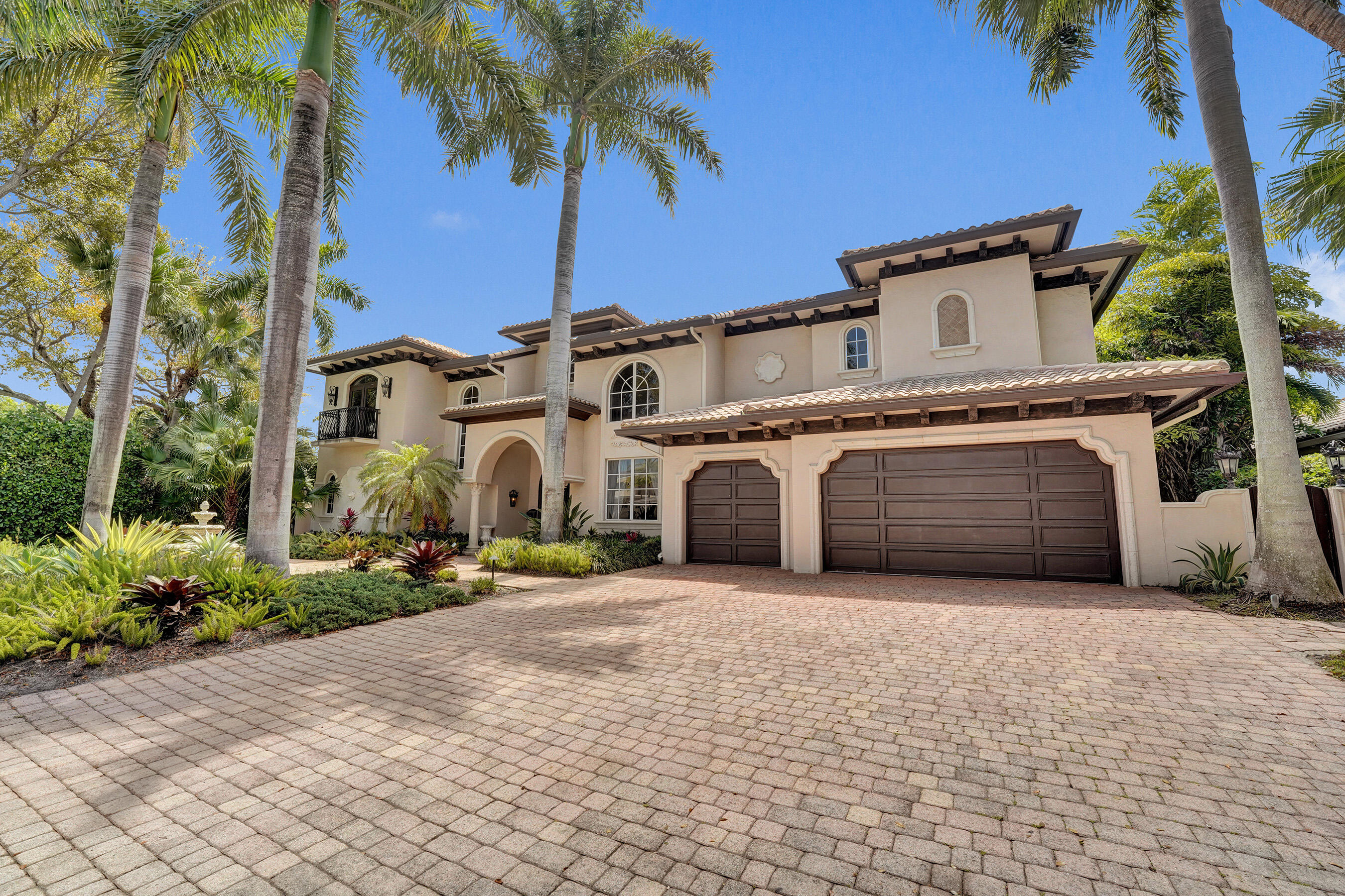 A Rare Offering in Harbor Beach - Designed for the Most Mediterranean Buyer Exquisite 6,200+ Sq. Ft. Curb appeal welcomes you into a residence defined by fabulous detail and uncompromising quality throughout. From tray and volume ceilings to custom woodwork and a stunning designer fireplace, every element reflects refined craftsmanship and timeless elegance. The grand primary suite spans over 1,500 square feet, featuring a private office and a serene sitting room, creating a true sanctuary within the home. Outdoors, experience a tropical resort-style pool area complete with a dining gazebo, ideal for elevated entertaining or tranquil relaxation. This exceptional property also includes access to a private marina to rent 25-120-foot boat slip and exclusive beach club privileges.