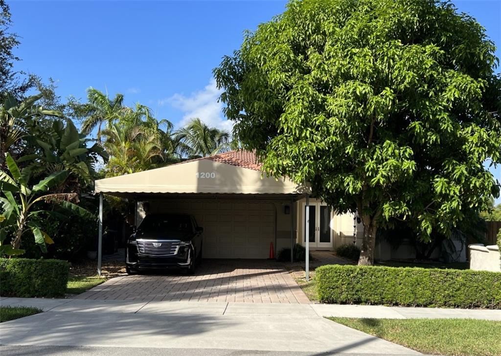 Beautiful mid 90's built corner home in a great location near intracoastal. The high vaulted ceilings, large PGT hurricane windows & doors bring in plenty of sunlight to this very cozy home. This updated house has a fresh new feel with an Alno german kitchen, large porcelain tiles that compliment the 4 bedrooms and 2 bathrooms open layout. The backyard is privately fenced off with a grass area on the north side, a good size pool/spa, nice entertaining area and fruit trees throughout the property. The Kitchen has stainless steel LG appliances while the garage is also updated with extra storage, tankless water heater, epoxy flake floor and an insulated hurricane garage door. Very close to Hallandale shops, Hollywood Beach, restaurants, Aventura mall and Beth El preschool.