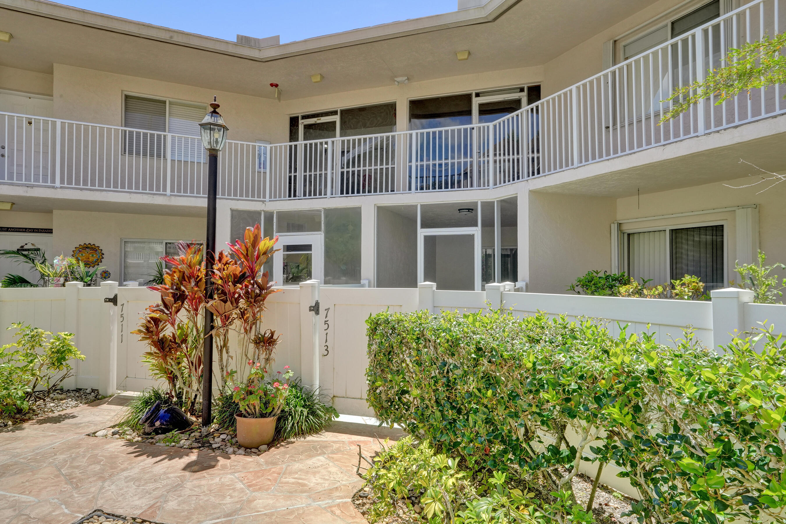 FIRST FLOOR unit in 2 story building in Trent - one of Kings Point's most desirable neighborhoods. Featuring an updated kitchen w/ eat-in area overlooking your screened in private patio. Kitchen has new white shaker cabinets, quartz counters, and stainless steel appliances. BRAND NEW AC 2026. Water heater 2020. Bathrooms have been updated with new vanities. Master bedroom features HUGE walk-in closet. Freshly painted!