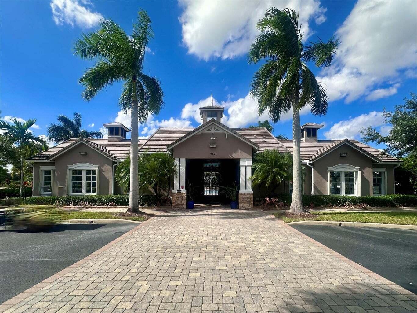 1868 sq.ft CBS Lake Front Home with great Water Views. 3-beds, 2-baths, 2 Car Garage. High Ceilings, Elegant Laminate Floor throughout the main living areas and 20" tile in bathrooms The kitchen has SS appliances and lots of counter space. The  master suite includes two Large Walk-in Closets, Dual Sinks & Vanities, a Separate shower, & Tub. Step outside to the covered, Screened Porch, where you can unwind while enjoying the Lake Views. HOA fees cover Lawn, Cable, High-speed Internet & Pest Control and more. Just steps away from the Tropical Club House, with Tiki Huts, Gym, pool, Jacuzzi. Don't wait!