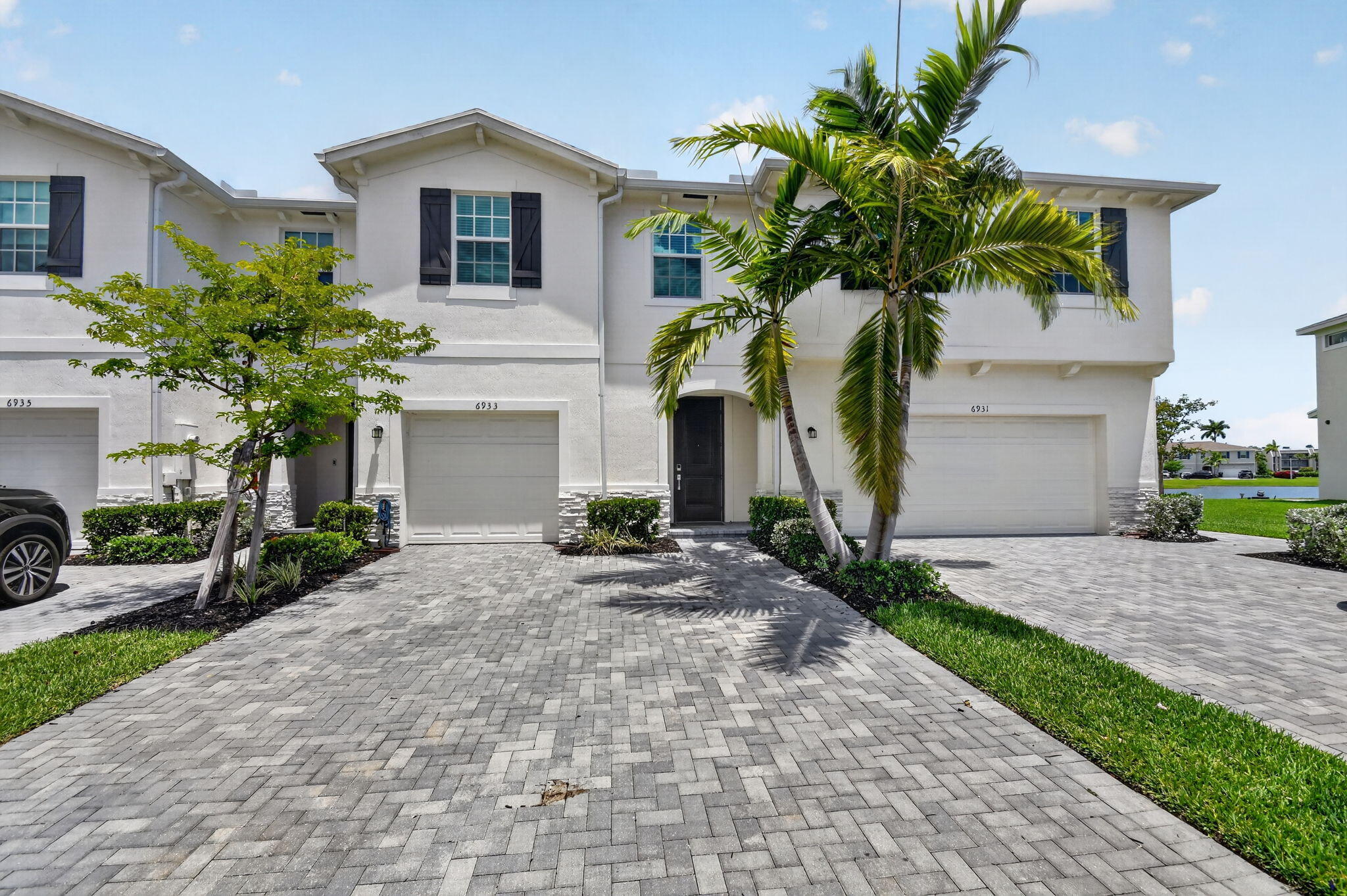 Modern Lakeside Living in Lake Worth | Gated Community 6933 Harbours Edge Avenue, Lake Worth, FL 33467 Discover the perfect balance of modern comfort and low-maintenance luxury in this beautiful 4-bedroom, 2.5-bathroom townhouse. Located in a premier gated community with 24-hour security, this home offers peace of mind and premium amenities in a highly sought-after location. Serene lake views from private patio. One-car garage. Low-maintenance living ideal for residents, seasonal owners, or investors. Resort-style access.  Rental Terms Included: High-speed internet is included in the rent. Utilities: Tenants are responsible for water and electricity.