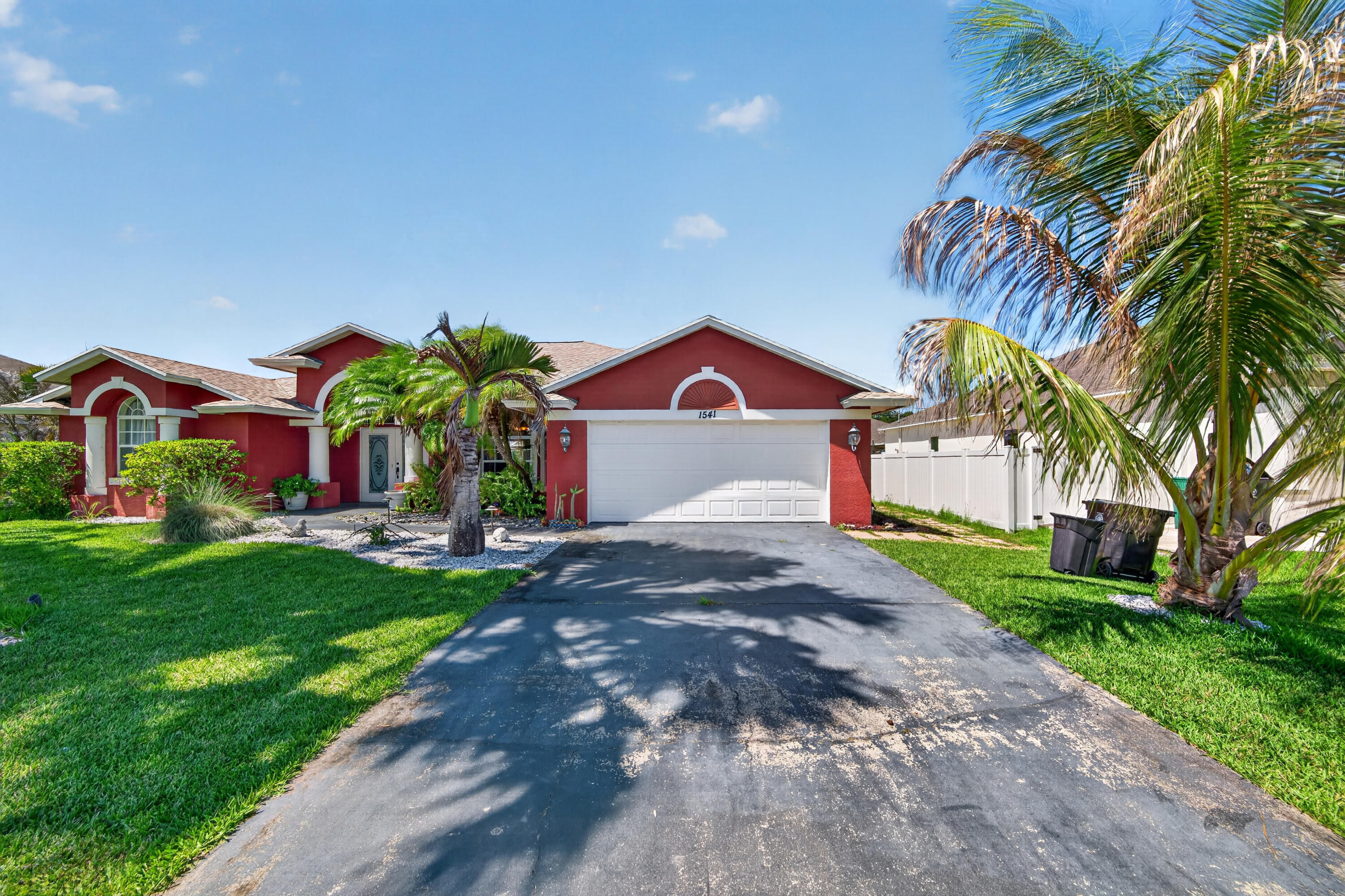 Welcome to 1541 SW Underwood Avenue, a beautifully maintained home nestled in one of Port St. Lucie's peaceful residential neighborhoods. This spacious property combines comfort, style, and Florida living at its finest, featuring an open-concept layout filled with natural light, generous living spaces, and a thoughtfully designed floor plan perfect for both relaxing and entertaining. The inviting kitchen flows seamlessly into the main living area, while the private backyard oasis showcases a screened, solar-heated pool surrounded by lush tropical landscaping—ideal for year-round enjoyment. With its blend of modern convenience, warm character, and serene outdoor living, this home offers the perfect retreat for families and guests alike. Welcome to 1541 SW Underwood Avenue, a beautifully maintained home nestled in one of Port St. Lucie's peaceful residential neighborhoods. This spacious property combines comfort, style, and Florida living at its finest, featuring an open-concept layout filled with natural light, generous living spaces, and a thoughtfully designed floor plan perfect for both relaxing and entertaining. The inviting kitchen flows seamlessly into the main living area, while the private backyard oasis showcases a screened, solar-heated pool surrounded by lush tropical landscaping—ideal for year-round enjoyment. With its blend of modern convenience, warm character, and serene outdoor living, this home offers the perfect retreat for families and guests alike.