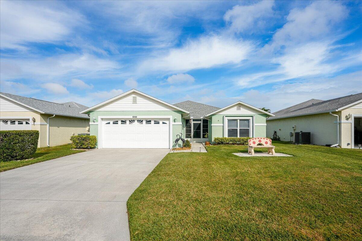 Welcome home to this impeccably kept home in a 55+ gated community. Great amenities: clubhouse, pool and social activities. Bright, open layout with thoughtful updates throughout: refreshed kitchen and baths, newer appliances/fixtures, and fresh paint/flooring. Split primary suite for privacy; flexible guest room/den. Enjoy Florida living and low-maintenance yard. Truly move-in ready—nothing to fix. Complete Accordian Hurrican Shutters. Minutes to shopping, dining, US-1 and I-95. Easy to show! Generator installed 2021 with transferable warranty until 2031 Roof Installed 2019 Water, sewer, cable and internet included in HOA Monthly fees. Amazing value making this a must see home