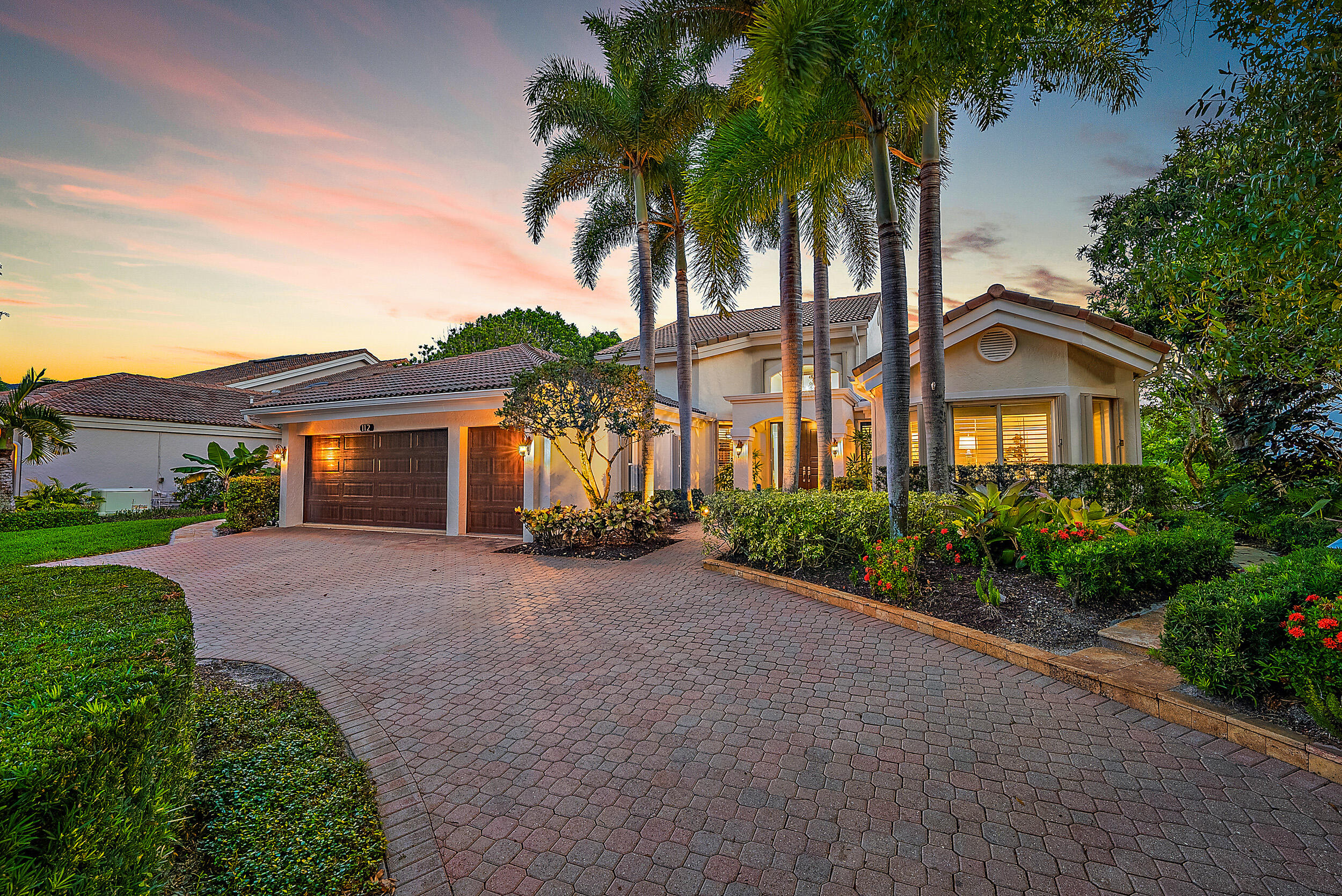 Custom home in the Admirals Cove Country Club featuring panoramic views of the 8th hole on the East Course. It shows with an elegant flare boasting high ceilings, abundance of light and spacious rooms.  The home is perfect for entertaining with a gourmet kitchen, lovely dining area, and a great room with wet bar. Outside you will enjoy a large, screened porch with dining and lounge area, outdoor kitchen, patio, pool and beautifully landscaped grounds with custom lighting.  The primary suite is gorgeous, with views of the pool and back yard and a luxurious bathroom. The home has been expanded with a large addition to the entire back of the house providing a combination den and 3rd bedroom, covered outdoor patio and huge primary suite closets. Located close to the club amenities! This beautiful home is superbly located is just a short golf cart ride away from all that the club has to offer such as tennis, pickleball, golf, clubhouse with gym, cards, and restaurants.  
It is private and you will feel like you are the only home on the golf course!