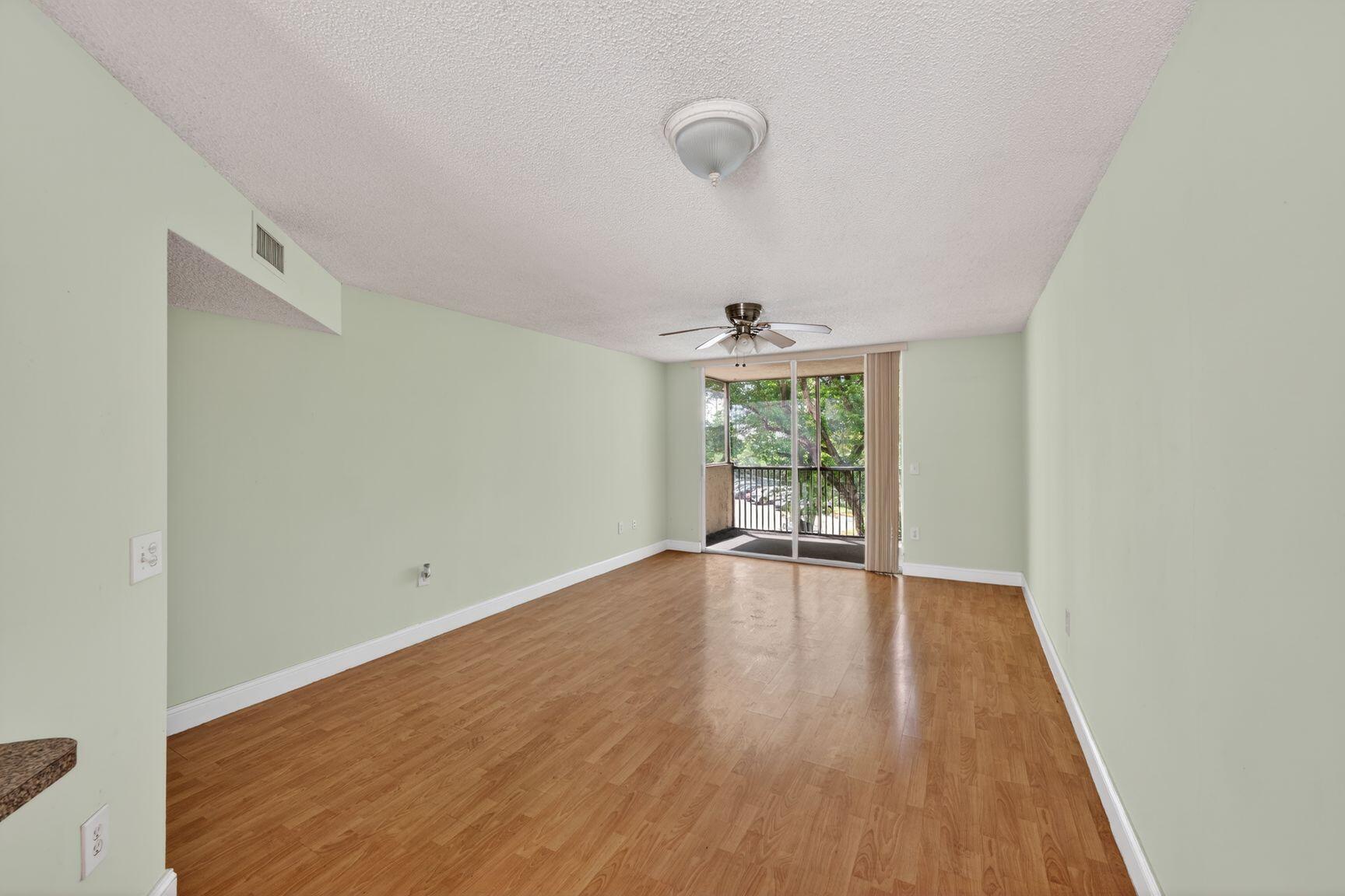 Bright and spacious first-floor 1-bedroom, 1-bathroom corner unit in the desirable Vistas at Doral. Features include a screened patio, extra storage, and a washer and dryer inside the unit. Enjoy resort-style amenities, including a pool, fitness center, tennis courts, and 24-hour security. Conveniently located near top-rated schools, shopping, dining, and major roadways. Move-in ready!