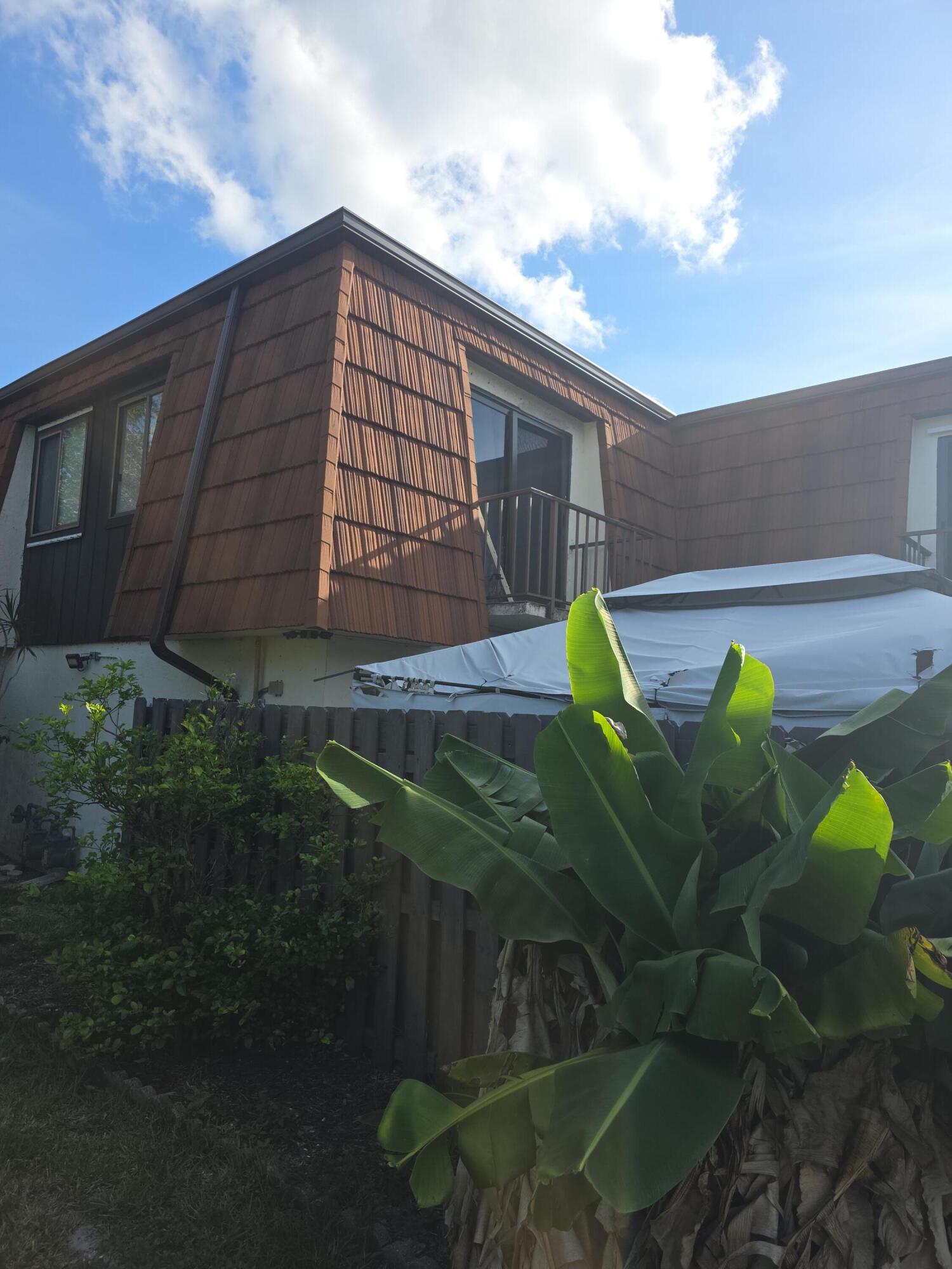 Lovely 2 bedroom 2.5 bath townhome with tiled floors throughout, upgraded closet systems in both closets, upgraded baths, high end impact sliders, private location, new a/c in 2022 and roof. A/C service is assumable for $194/mo includes all service for a/c
