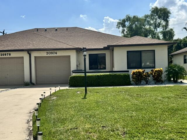 You do not want to miss this incredible opportunity to own a beautiful spacious villa in the heart of Boca, ideally located & zoned for A schools. This nearly 1,600 sqft home features a desirable open split floor plan, 3 generously sized bedrooms & a screen-enclosed patio perfect for relaxing or entertaining. Concord Green is a pet-friendly, boutique lakefront community offering a serene walking path, sparkling pool & tennis court. The low HOA fee covers cable, internet & landscaping. Centrally located minutes to the Turnpike, close to top shopping, dining, parks & beaches. This one won't last! Water heater replaced 12/2025, Roof replaced 2020.