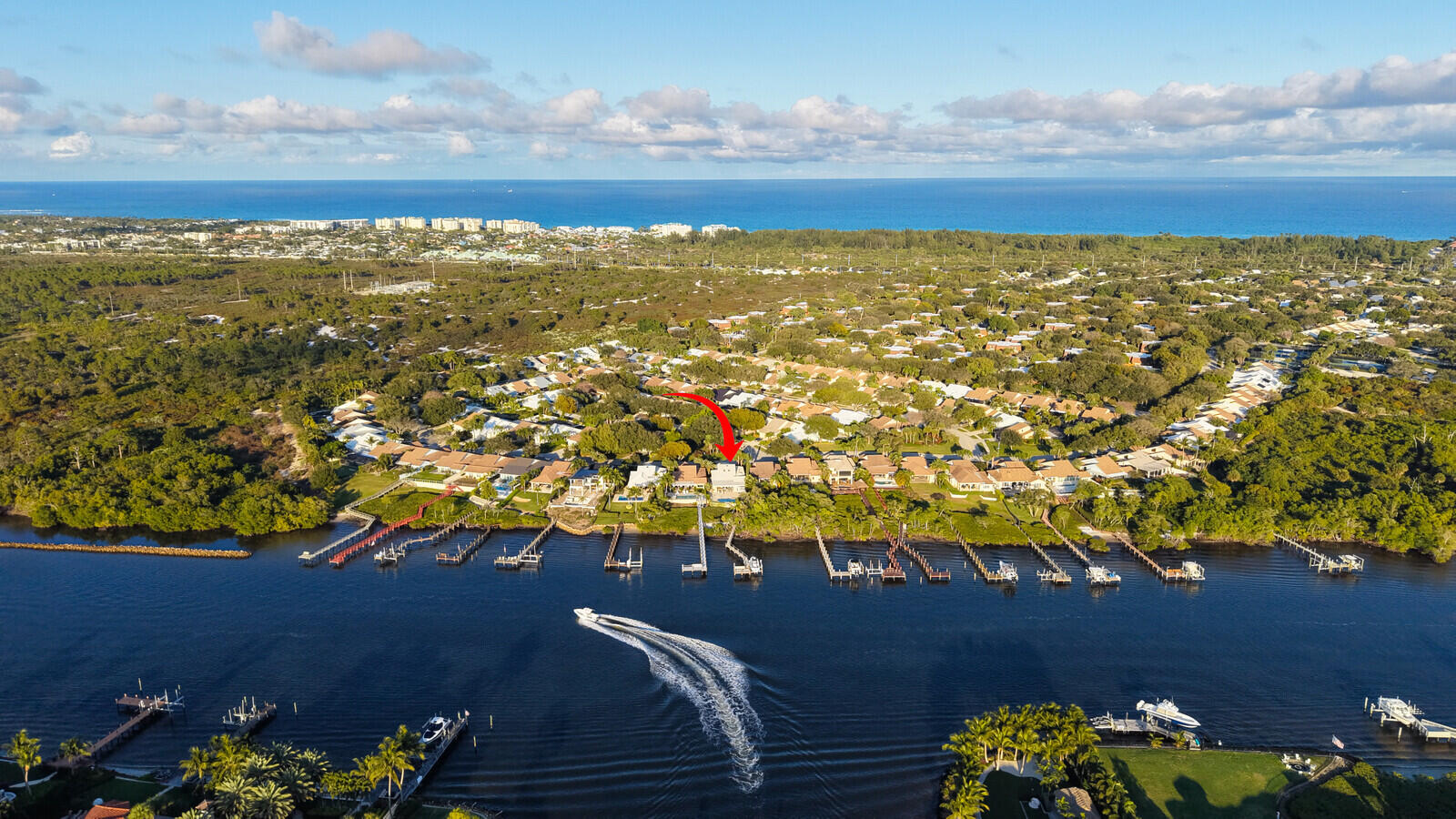 Discover true waterfront living on the Intracoastal in The River at the Bluffs. This rarely available 4-bed, 3.5-bath home offers direct Intracoastal frontage with unbelievable sunset views and a lifestyle built around the water. Enjoy a private dock with boat lift, a heated saltwater pool, and a separate cabana perfect for guests or outdoor entertaining. The home features a new metal roof, impact glass throughout, and a footprint that is larger than the original Bluffs floor plan, providing expanded living space and versatility. Step outside to your own private waterfront oasis and watch boats pass by, or head to nearby Jupiter Beach, just minutes away. A rare opportunity to own a solid, well-maintained Intracoastal property in one of Jupiter's most desirable waterfront communities. Residents of The River enjoy outstanding amenities including a community pool, tennis and pickleball courts, basketball, playground, and more!