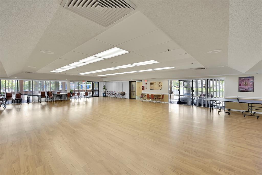 55+ COMMUNITY, 2/2 GROUND FLOOR RIVEIERA MODEL WITH WATER VIEW FROM EXTENDED FLORIDA ROOM.  HURRICANE SHUTTERS, FRONT AND BACK.  NICE KITCHEN WITH STAINLESS STEEL APPLIANCES, FORMICA COUNTERTOP, HAS ITS'S OWN LAUNDRY ROOM NEW WASHER, JUST LISTED, WON'T LAST!!