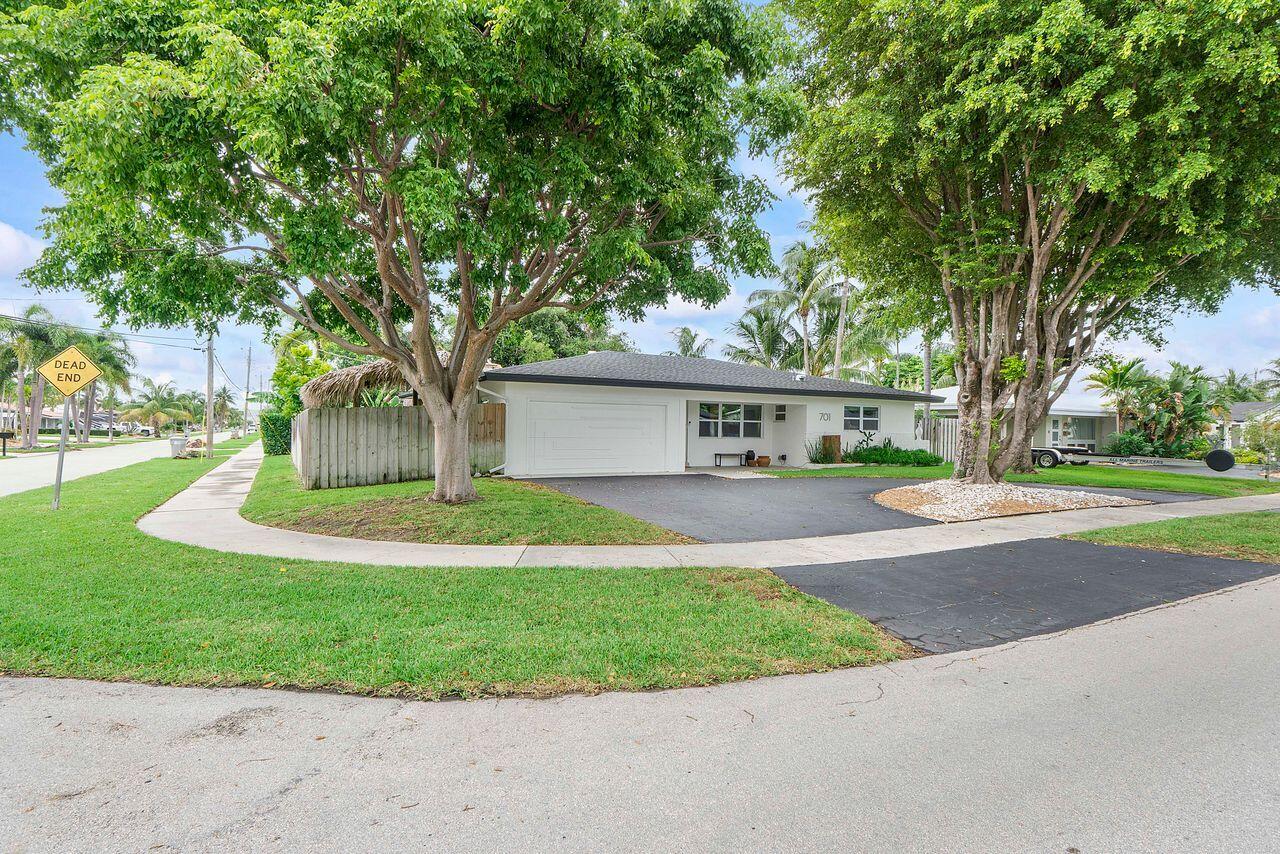 If you are looking for a special house this is the one! Everything has been updated or upgraded; roof, impact windows and doors, gorgeous top of the line kitchen and bathrooms, air conditioner, water heater, electric, plumbing has been replaced with PVC Not to mention, this house is gorgeous! Tucked away at the back of a quiet neighborhood but just 2 miles from the beach, pier, and all the great restaurants and stores.