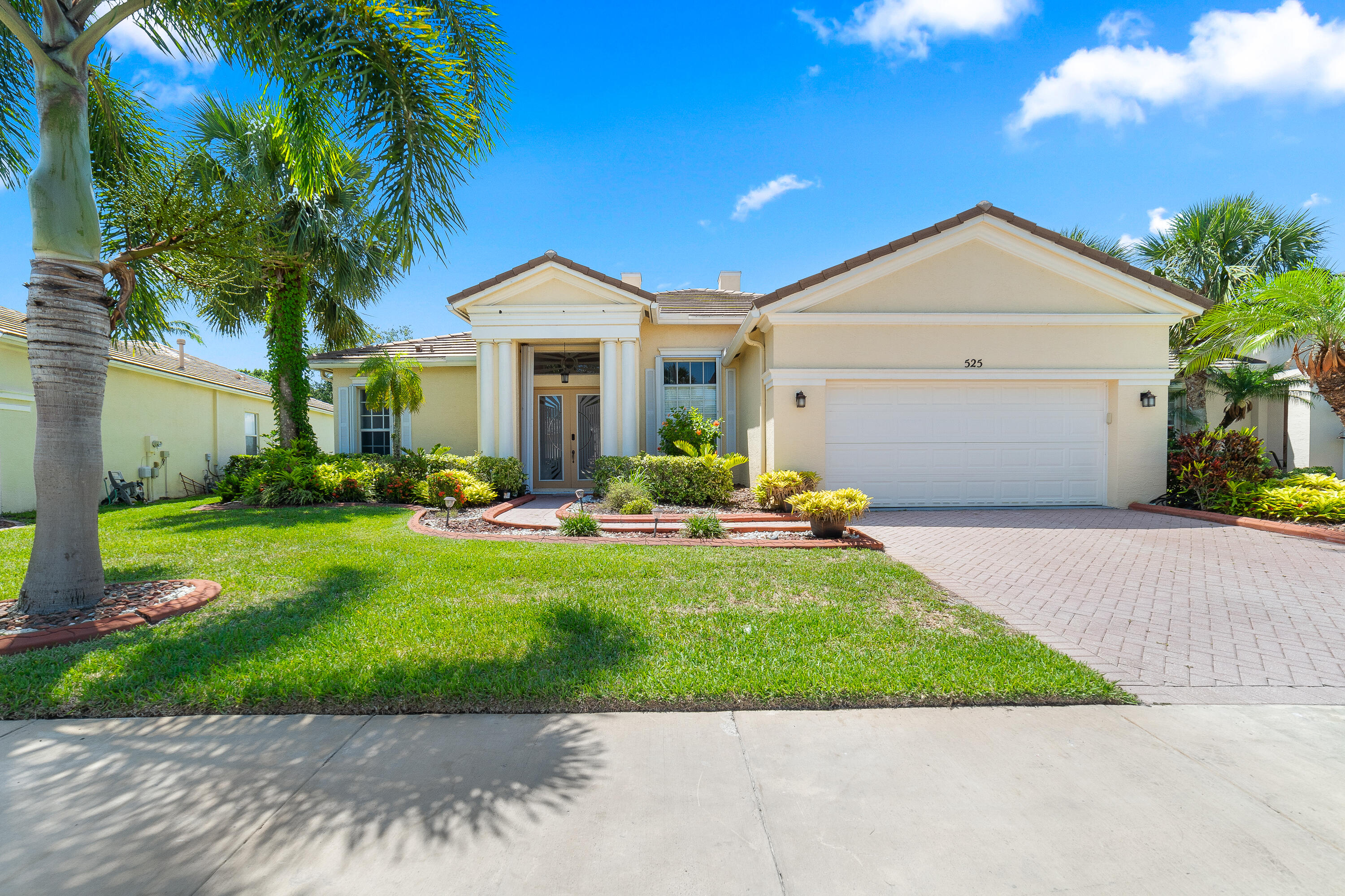Welcome to Your New Lakefront Retreat in Lake Forest at St. Lucie West.  Inside this beautifully maintained CBS lakefront home you'll experience Florida living at its finest. Designed for both comfort and elegance, the interior offers a bright and spacious layout featuring tile flooring throughout. The kitchen is a showpiece with decorative cabinetry, pantry, granite countertops, a breakfast bar, and stainless steel appliances—perfect for hosting or everyday living. The home boasts a formal living room and separate dining area with a large window framing serene lake views. The expansive family room opens to an extended screened patio through sliding glass doors, making it ideal for entertaining or simply relaxing lakeside. Retreat to the primary bedroom suite, complete with tray ceilings, patio access, dual walk-in closets, and a luxurious bathroom offering a garden tub, separate shower, and dual vanities. Vaulted ceilings throughout the home enhance the open, airy atmosphere. The exterior complements the interior with a brick paver driveway, accordion shutters, and a concrete tile roof a combination of style and durability. Located in the desirable gated community of Lake Forest at St. Lucie West, residents enjoy a host of amenities including two pools, a spa, clubhouse, fitness room, playground, and picnic area. Just a short stroll to shopping and dining, this home offers convenience, comfort, and the sought-after Florida lifestyle. Port St. Lucie is an increasingly popular destination for new homeowners thanks to its welcoming atmosphere, top-rated schools, expanding job market, and beautiful natural surroundings. With easy access to I-95 and the Florida Turnpike, you're never far from the coast or nearby metropolitan hubs.