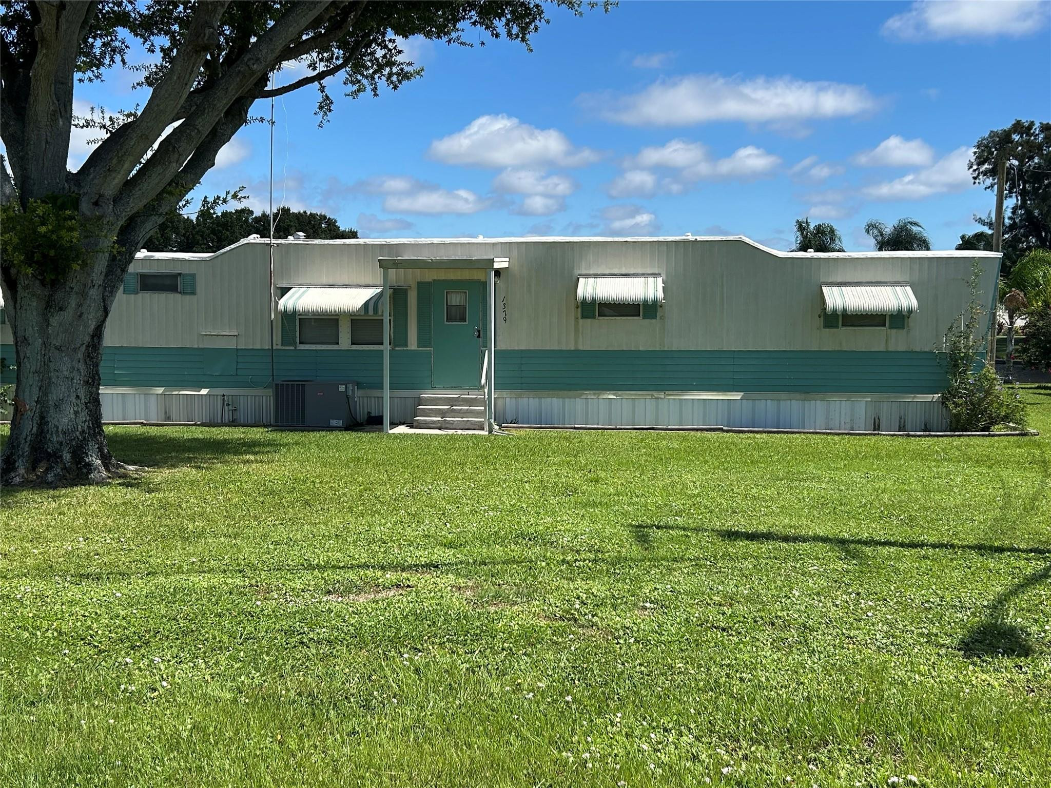 ~BUCKHEAD RIDGE~ Seller Financing Available - Charming 2 bedroom/ 2 full bath Singlewide mobile home with access to Lake Okeechobee. 1,220 sq. ft with many upgrades. New LPV flooring throughout, newer A/C, upgraded pluming, new under pinning, private Boat ramp, small private dock and a good sturdy sea wall. Large Florida room, fire pit and storage shed. Already paid 4-year termite treatment. This home has been cared for with love. Call today for your showing today. Measurements are approximate.