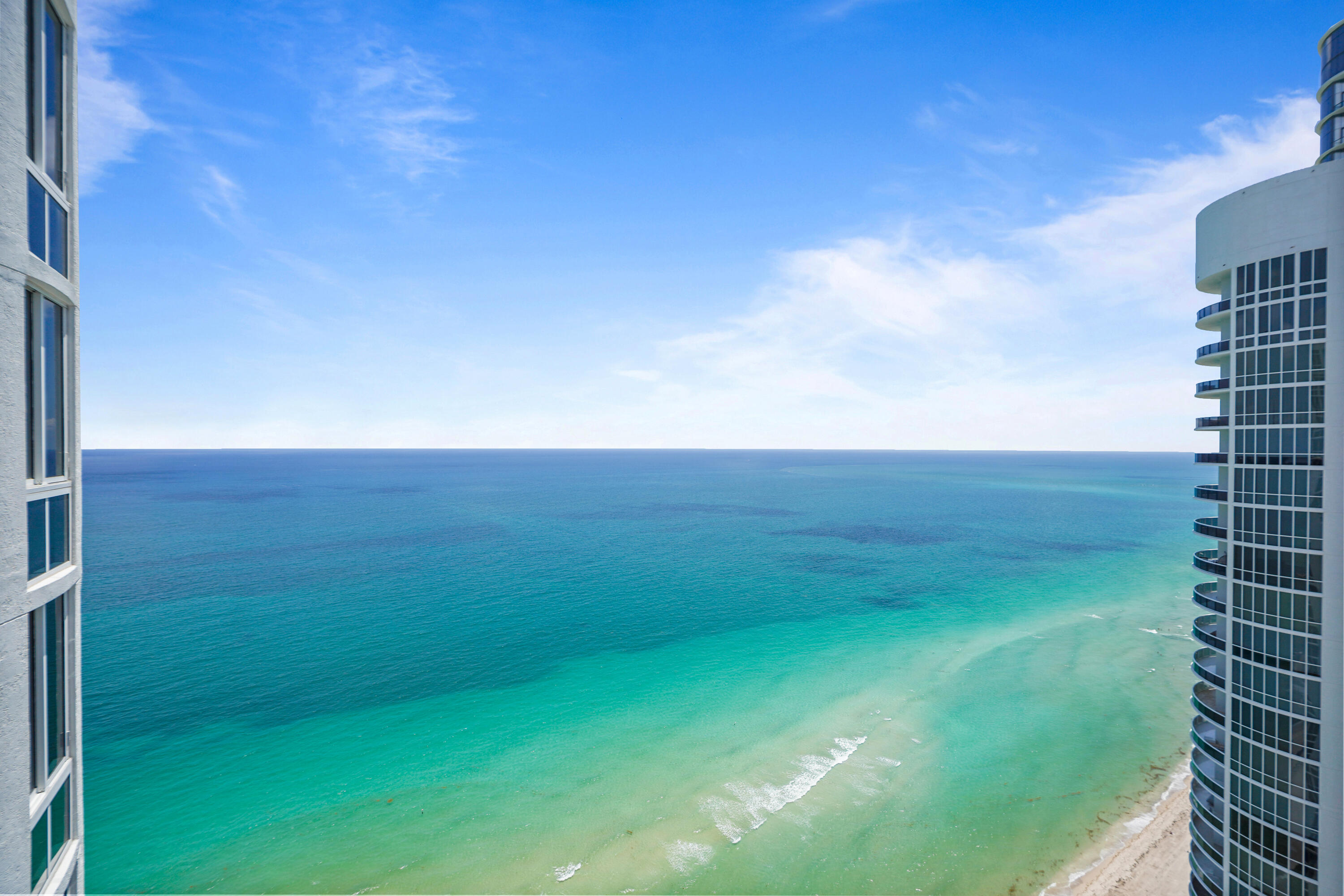 Welcome to the Exclusive Oceanfront Residence in Prestigious Sunny Isles Beach. Experience elevated coastal living in this exquisite 3-bedroom, 3.5- bathroom residence, ideally positioned on the 39th floor with 11f ceiling. This sophisticated home welcomes you with a private elevator entrance- offering the privacy and exclusivity. The thoughtfully designed open-concept layout seamlessly blends elegance and comfort.  Floor-to-ceiling glass doors frame breathtaking, unobstructed views of the Atlantic Ocean. filling the space with natural light and creating a serene, resort-style atmosphere. Please call the Listing agent for all appointments. The Buyer and the Buyer's agent  to verify all the measurements and information.