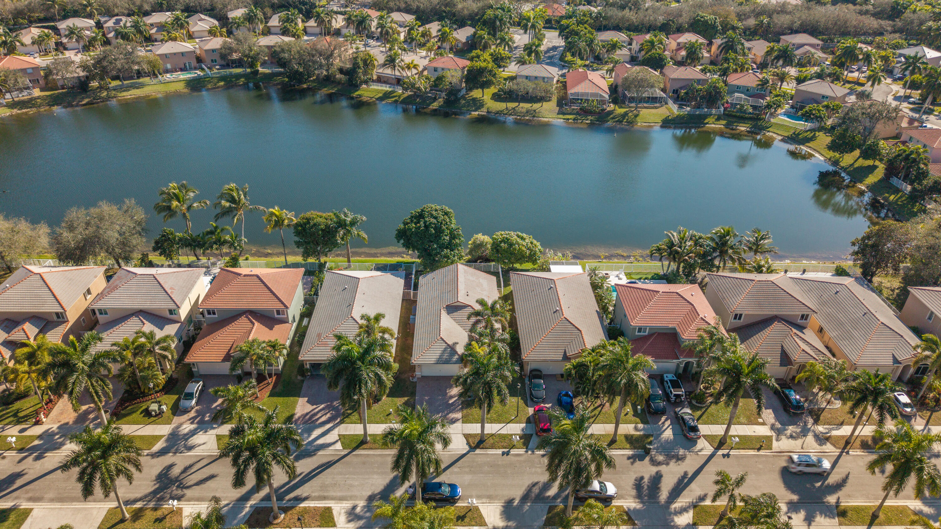 Lakefront vibes, clean upgrades, and easy Florida living. Welcome to 3800 Woodfield Drive in Coconut Creek—featuring 3 bedrooms, 2 bathrooms, and peaceful water views that instantly slow things down. Inside, enjoy new laminate flooring, fresh interior paint, and an updated primary bathroom. The home also offers a separate laundry room, new water heater, new microwave, and new oven/stove, plus a brand-new fence and new sprinkler pump. Outside, enjoy scenic lake views while under your very own Thai mango Tree! Top it off with two community pools and you've got a home that checks boxes and looks good doing it. Move-in ready, lakefront, and low stress—this one just works.