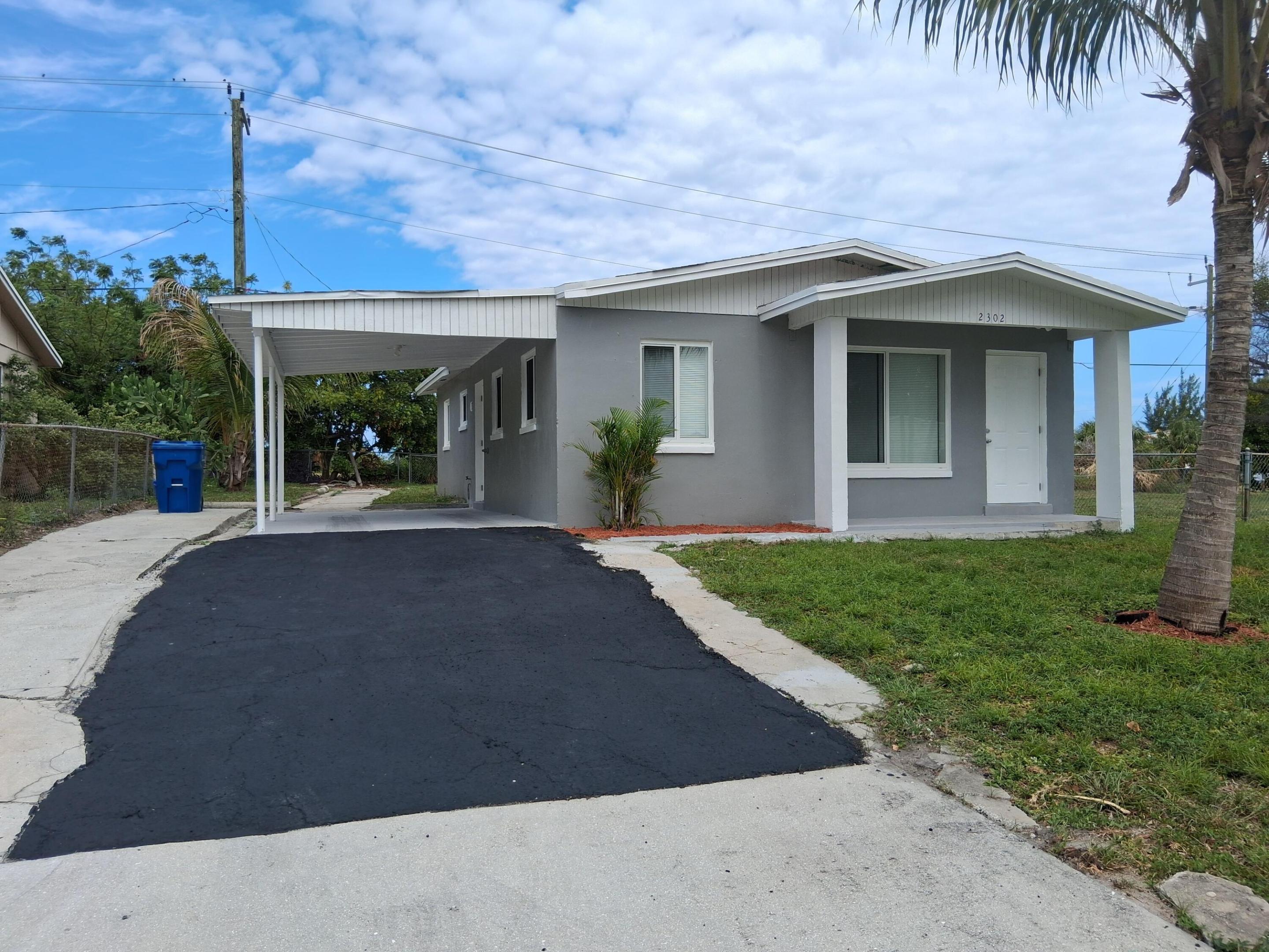 Beautifully renovated 3/1 SINGLE FAMILY HOME in the beautiful City of Riviera Beach!!! NEW Kitchen w/ Stainless Steel Appliances, NEW bathroom, NEW Hurricane Impact Windows, NEW Vinyl & Ceramic Tile Flooring throughout, NEW Central A/C & Heat, NEW Hot Water Heater, Ceiling Fans, Washer, Dryer & more! Less than 5 minutes away from the BEACH !!! NO HOA!!!