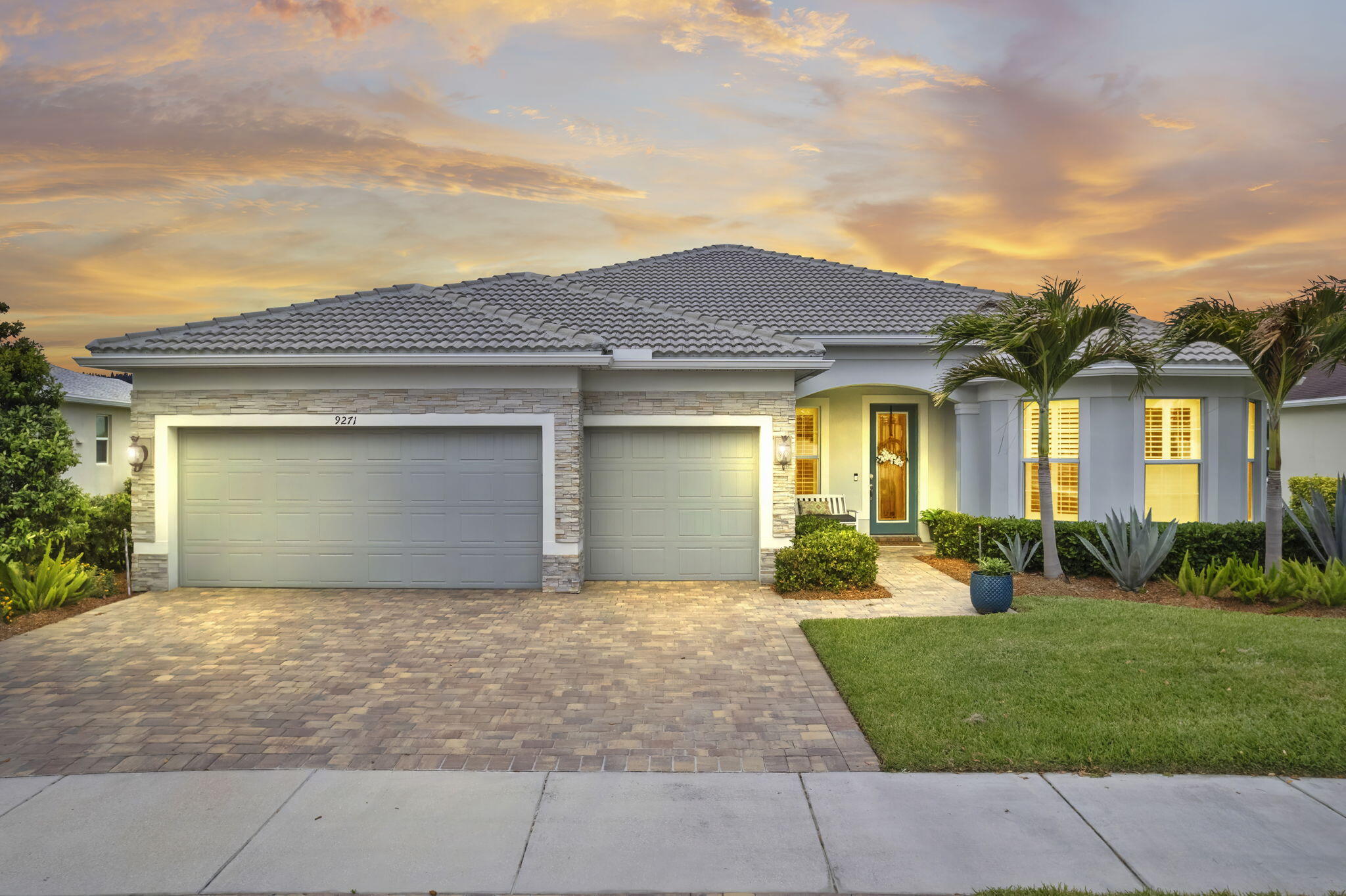 This picture-perfect home has it all! Located in the sought-after Del Webb resort-like community where every day feels like a vacation day. This Pinnacle model home has a beautifully laid out floor plan with an upgraded extended lanai on a premium lake view lot. Walk in for a wow factor with an open airy  great room, spacious kitchen with a massive island, and large dining area all open to the extended lanai with serene water views for a versatile Florida lifestyle. Three large bedrooms with en-suites, plus an office/den, all separated for privacy. Upgraded features include crown molding throughout, porcelain tile flooring, volume ceilings, 8-ft panel doors, plantation shutters, water softener, reverse osmosis, 42-inch cabinets, quartz countertops, and gas appliances. (more remarks below) Solid CBS construction, with impact windows and doors and barrel tile roof. Also, a whole house Generac generator 2 years new, 26kw (the largest made). The 3-car garage has custom epoxy floors, overhead storage and plenty of room for your golf cart to go to all the shops and Del Webb amenities, including 2 community pools, with cabanas, 2 clubhouses, a barefoot bar, catering kitchen, courts, a billiard room, craft room, dog park and more. Too much to mention! This is a great price for this amazing home!  Floor plan in photos and documents.