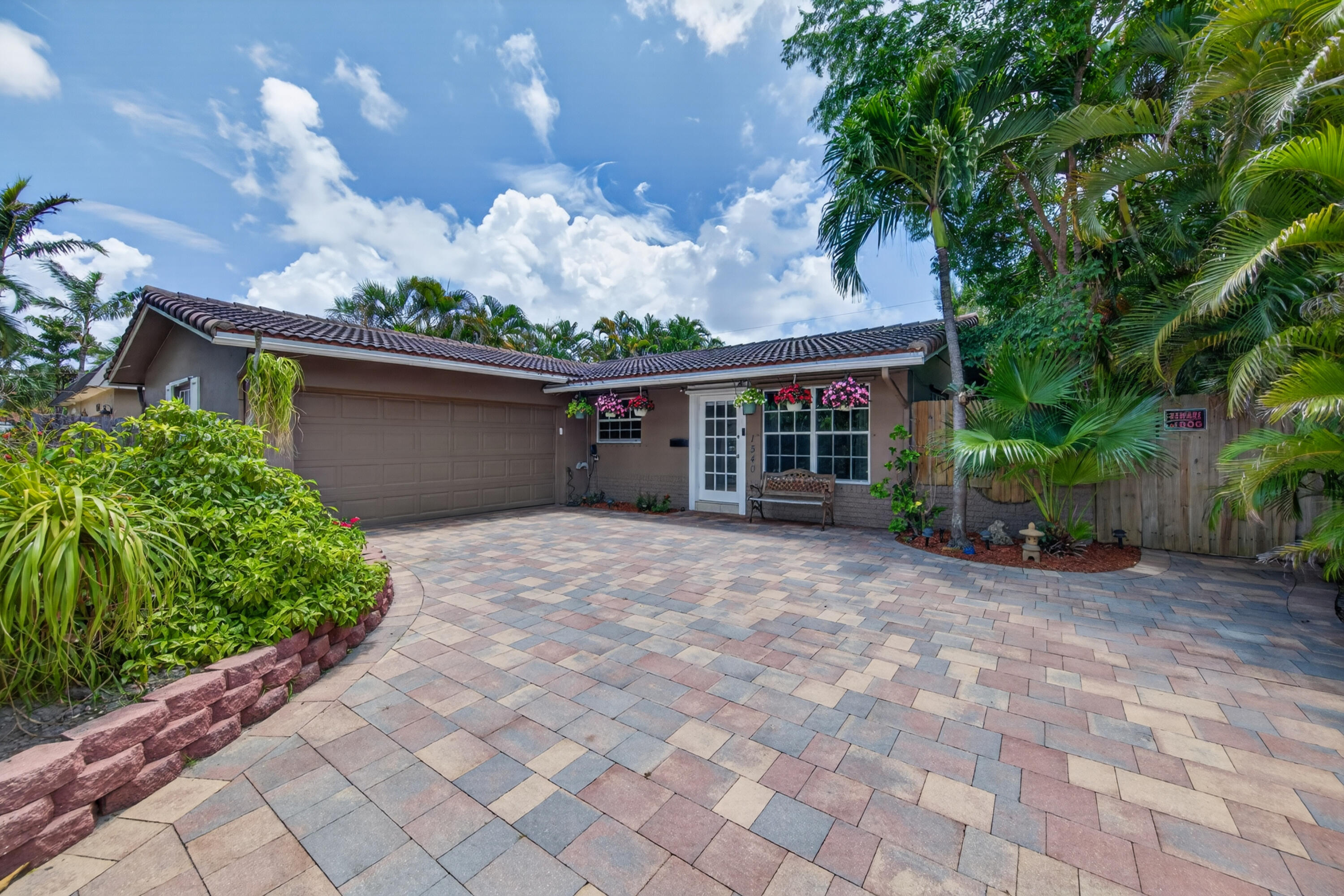 Welcome to this charming 3-bedroom, 2-bathroom home in the highly desirable Oakland Park neighborhood. Located on a quiet dead-end street with no through traffic, this home offers privacy and a peaceful setting. Inside features a bright open layout with an open kitchen flowing into two spacious living/dining areas, ideal for entertaining or everyday living. Enjoy the large enclosed patio overlooking a sparkling saltwater pool, perfect for year-round relaxation. Additional highlights include a wide attached 2-car garage, insulated attic for energy efficiency, roof replaced in 2008, A/C installed in 2003, and a recent tenting with transferable warranty for added peace of mind. This Oakland Park gem is ready to welcome you home.