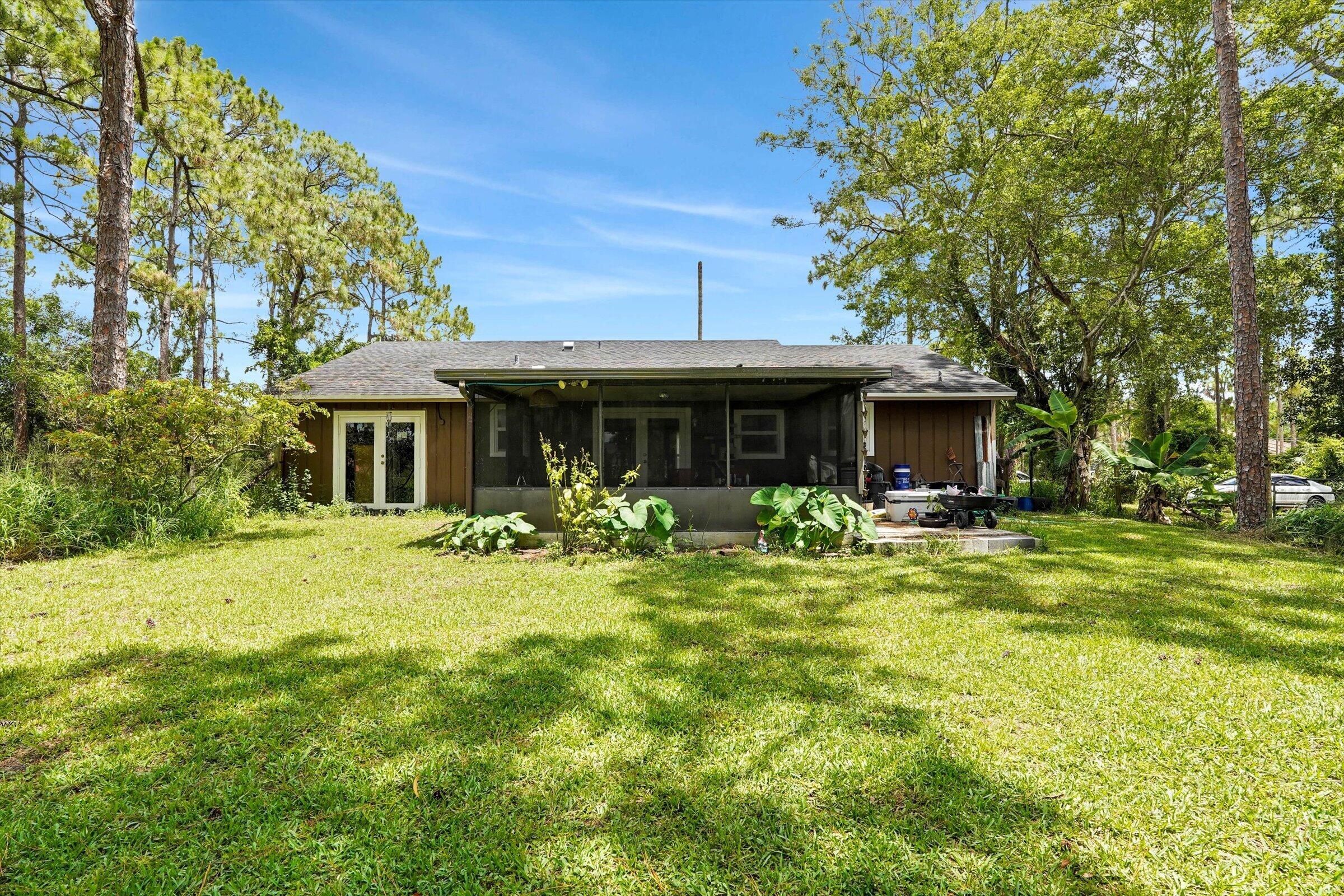 Experience the space, privacy, and freedom of life in The Acreage. Set on a generous 1.15-acre lot, this property offers room to breathe, grow, and create the lifestyle you've been looking for. Imagine morning coffee with peaceful outdoor views, weekends spent gardening, entertaining, storing your toys, or planning future improvements. With no HOA, a newer well, and plenty of open land, this is a rare opportunity to enjoy country-style living while still being close to shopping, dining, parks, schools, and major roadways.