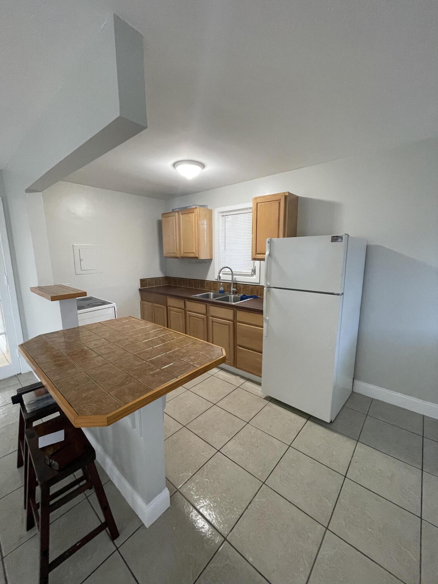Welcome to this charming single-story residence located in Southboro Park, West Palm Beach. This one-bedroom, one-bathroom home offers 500 square feet of finished living space, providing an efficient and manageable layout. Situated in the heart of West Palm Beach, this property presents an excellent opportunity for those seeking a compact, well-positioned residence. The straightforward floor plan maximizes usability and ease of maintenance. This single-family home in Southboro Park awaits its next owner.