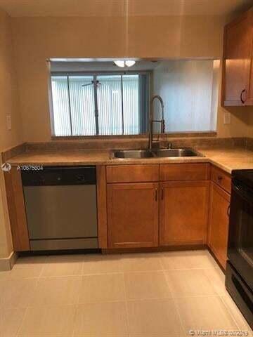 CONDO 3 OF SABAL PALM CONDOS - Residential Lease