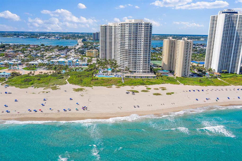 Enjoy magnificent panoramic direct ocean beach and intercoastal waterway views from this high floor Ritz Carlton A Tower residence.
This spectacular floor plan offers three bedrooms and three and a half baths in 3600 square feet of living area with over 500 feet of waterfront terraces. Professionally decorated and furnished by the Seed Design Management, a New York City interior design firm, the Seeds team created a transitional Balinese design based on refined wall and ceiling architecture incorporation.