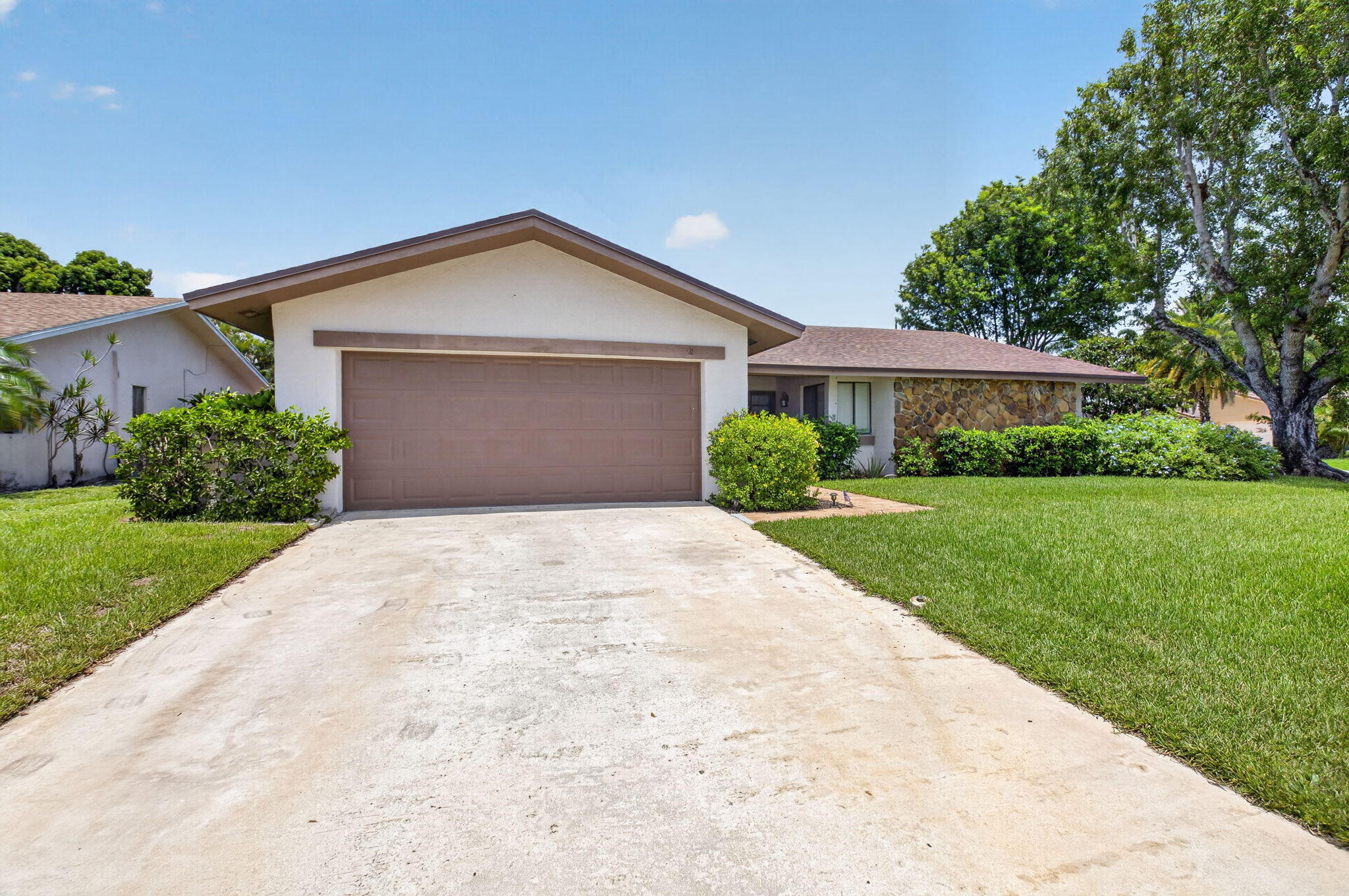 Welcome to this charming and spacious 4-bedroom, 2-bathroom home in the highly sought-after community of Pheasant Walk! Featuring a desirable open-concept floor plan, this home offers the perfect blend of comfort and functionality for everyday living. Situated on a huge corner lot on one of the most desirable streets in the neighborhood, the property boasts a beautifully landscaped, fully fenced backyard with a large sparkling pool—your own private oasis for relaxing, entertaining, and enjoying the South Florida lifestyle. Ideally located in the heart of Boca Raton, Pheasant Walk offers easy access to premier shopping, exceptional dining, beautiful beaches, and major commuter routes. Families will also appreciate the proximity to top-rated schools, including Calusa Elementary School.