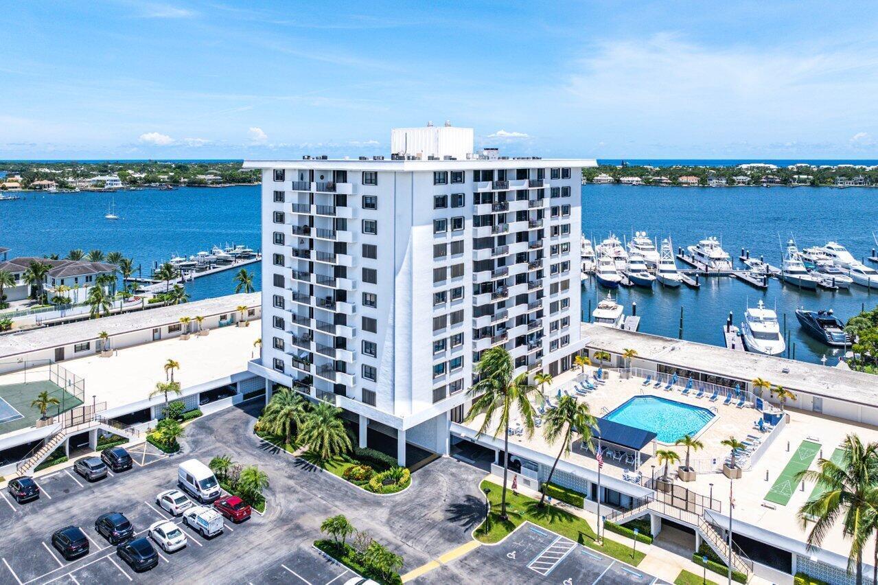 Every evening ends with a front-row seat to spectacular Florida sunsets from this beautifully furnished fifth-floor residence in the prestigious gated community of Old Port Cove. Unlike many condominiums, this home offers warm western exposure that fills the living space with natural light throughout the day before transforming into breathtaking sunset skies you'll look forward to every evening. Designed for easy, maintenance-free living, this move-in-ready residence features an open-concept layout, an updated kitchen with a breakfast bar perfect for entertaining, in-unit washer and dryer, and an assigned garage parking space (#101). Whether you're searching for a full-time residence or the perfect seasonal getaway, this condo is ready to enjoy from day one.Life at Old Port Cove is about more than just the home its about the lifestyle. Residents enjoy 24-hour manned security, a world-class marina accommodating yachts from 30 to 200 feet, over two miles of scenic waterfront walking paths, and convenient access to some of North Palm Beach's favorite dining destinations, including Cod & Capers, Cucina Cabana, and Belle's Bar & Grill. Beaches, golf courses, shopping, and Palm Beach International Airport are all just minutes away.Additional features include a 2017 air-conditioning system, 2015 water heater, one assigned garage parking space, and the ability to have one pet up to 20 pounds. If you've been searching for an affordable opportunity to enjoy the coveted Old Port Cove lifestyle, this is one you won't want to miss.Schedule your private showing today and experience everything this exceptional community has to offer before this opportunity is gone.