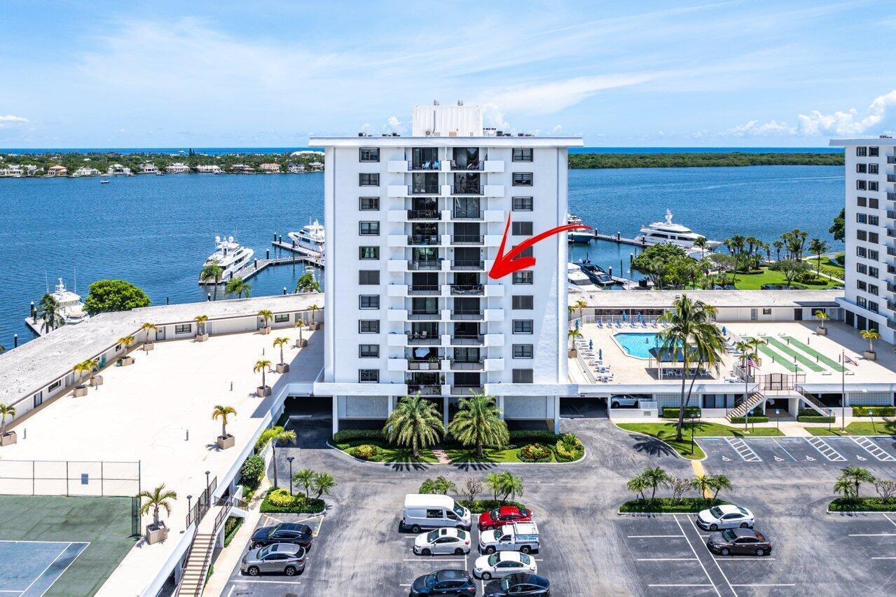 Every evening ends with a front-row seat to spectacular Florida sunsets from this beautifully furnished fifth-floor residence in the prestigious gated community of Old Port Cove. Unlike many condominiums, this home offers warm western exposure that fills the living space with natural light throughout the day before transforming into breathtaking sunset skies you'll look forward to every evening. Designed for easy, maintenance-free living, this move-in-ready residence features an open-concept layout, an updated kitchen with a breakfast bar perfect for entertaining, in-unit washer and dryer, and an assigned garage parking space (#101). Whether you're searching for a full-time residence or the perfect seasonal getaway, this condo is ready to enjoy from day one.Life at Old Port Cove is about more than just the home its about the lifestyle. Residents enjoy 24-hour manned security, a world-class marina accommodating yachts from 30 to 200 feet, over two miles of scenic waterfront walking paths, and convenient access to some of North Palm Beach's favorite dining destinations, including Cod & Capers, Cucina Cabana, and Belle's Bar & Grill. Beaches, golf courses, shopping, and Palm Beach International Airport are all just minutes away.Additional features include a 2017 air-conditioning system, 2015 water heater, one assigned garage parking space, and the ability to have one pet up to 20 pounds. If you've been searching for an affordable opportunity to enjoy the coveted Old Port Cove lifestyle, this is one you won't want to miss.Schedule your private showing today and experience everything this exceptional community has to offer before this opportunity is gone.