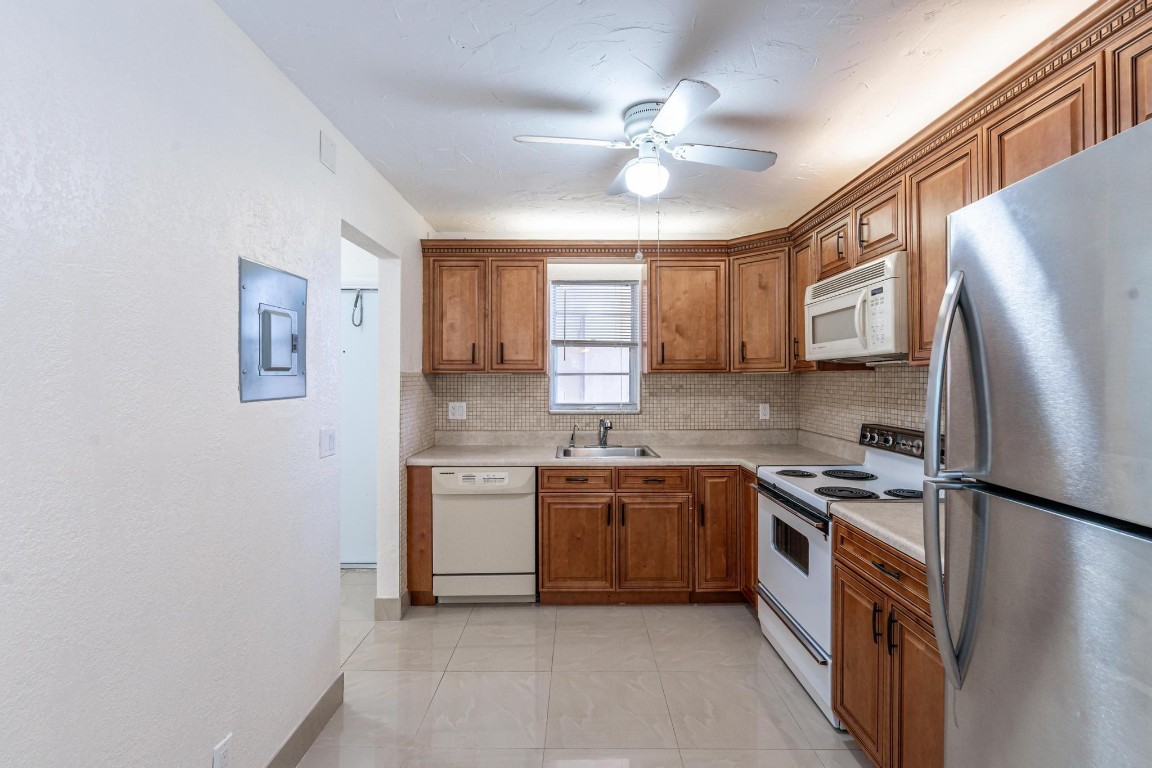Gorgeous completely remodeled 1 bedroom1 .5 half bathrooms guest Murphy bed enclosed patio area. Newer kitchen, beautiful vinyl wood floors and tile throughout. New elevator will be arriving soon. One person has to be 55 and over,in this 55 and older community offers amenities, including a pool barbecue area, clubhouse gym and sauna your are located 10 minutes from the Sawgrass Mills mall walking distance to restaurants and supermarkets no income verification required for condo approval. New elevator coming...