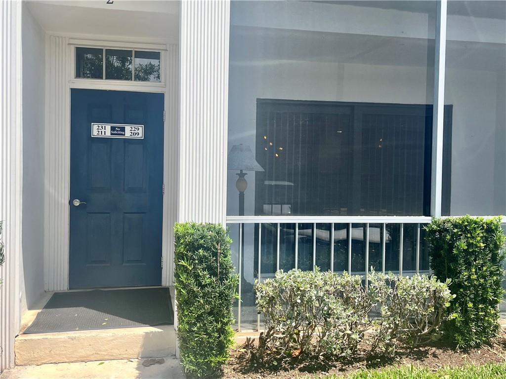 Beautifully remodeled 2/2. 1st floor condo w/huge inside storage room (could be small office) also under stair storage. Assigned parking right front of unit. Giant closet in ensuite MBR. Newer impact windows and sliders. Blinds will stay. Low HOA, great pool area w/grills, sauna and  club house. On canal w/ dock space, intracoastal and ocean access (bridge being elevated), you can kayak and paddleboard. Newer light gray carpet in BRS, laminate throughout rest. Gorgeous newer kitchen. Quiet, clean, friendly, safe, active community. Screened patio. Pets ok. All ages. Close to beach and highways. Easy to show on a lockbox. There are NO reserves in the HOA budget