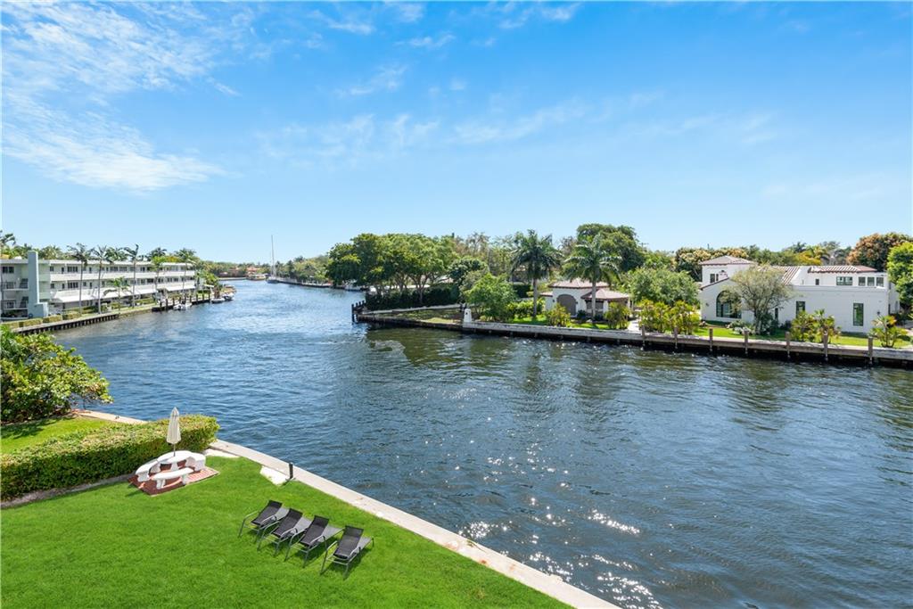 One block from all the fun of Las Olas Blvd. Designated downtown Parking space. Recently remodeled in coastal/Florida style, in a very well-kept mid century building. White shaker kitchen with center island. Dramatic direct third floor New River views, watch the boats all day. Porcelain light wood look tile floors. Secure elevator. Open catwalk, very close to elevator. Covered parking. Very friendly community. Come see now, wont last long.