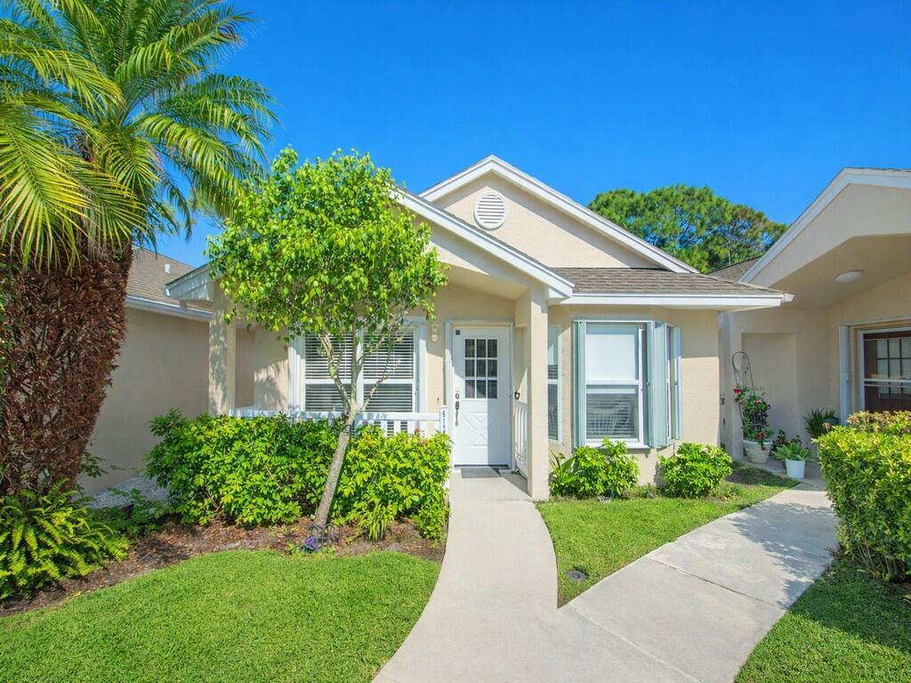 Charming villa located in Kings Isle, a desirable 55+ community. This well-maintained home offers 2 bedrooms, 2 bathrooms, and a convenient carport at the entrance of courtyard. Features title flooring throughout, updated kitchen with white cabinets, quartz countertops and beautiful backsplash. Additional improvements include Brand new Electrical Panel, newer LG washer and dryer, 2023 W/H. freshly painted interior, and partial hurricane shutters for front windows and door. Villa has been fully re-piped for added peace of mind.  Relax and unwind in the spacious screened and enclosed patio perfect for relaxing or entertaining.  Hassle free HOA includes Lawn Care, internet, cable, and manned guard gate Welcoming Resort style Clubhouse with recreational facilities. Conveniently located near shopping, medical center, golf course, and I-95,