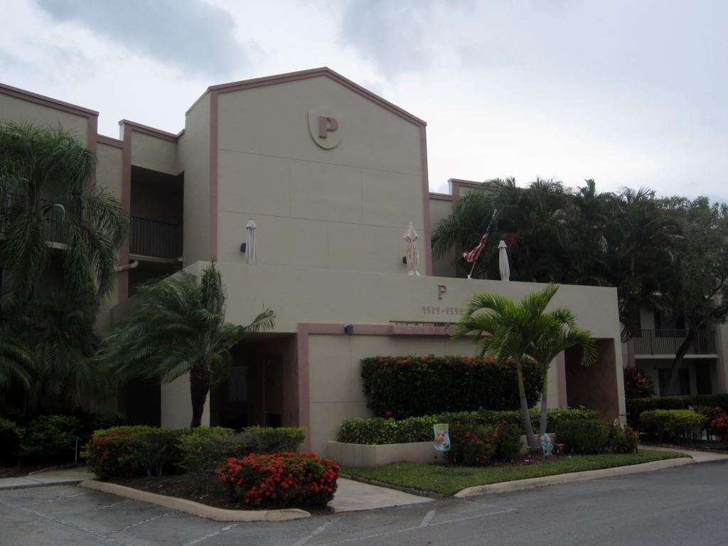 ***VIRTUAL TOUR AVAILABLE***RARE GROUND FLOOR PARTIALLY REMODELED BANYAN W/ FABULOUS LAKE VIEW***freshly painted***brand new gorgeous waterproof laminate in most rooms***remodeled master bathroom** Large Florida room that gives you option to use for another bedroom, entertainment space or office***NEWER A/C (2017)***Parking space #110 has a path that conveniently leads you right to your front door****Huge laundry/storage room w/washer/dryer**"agreement for deed has been paid in full" means lower maintenance***Association says 55+**maintenance includes; water/sewer/trash/internet/cable/courtesy bus***neighborhood heated pool***24 hour gated community***60,000 sq ft. clubhouse w/indoor & outdoor pool**exercise room***fitness center***trips***clubs***Theater w/live shows & movies***