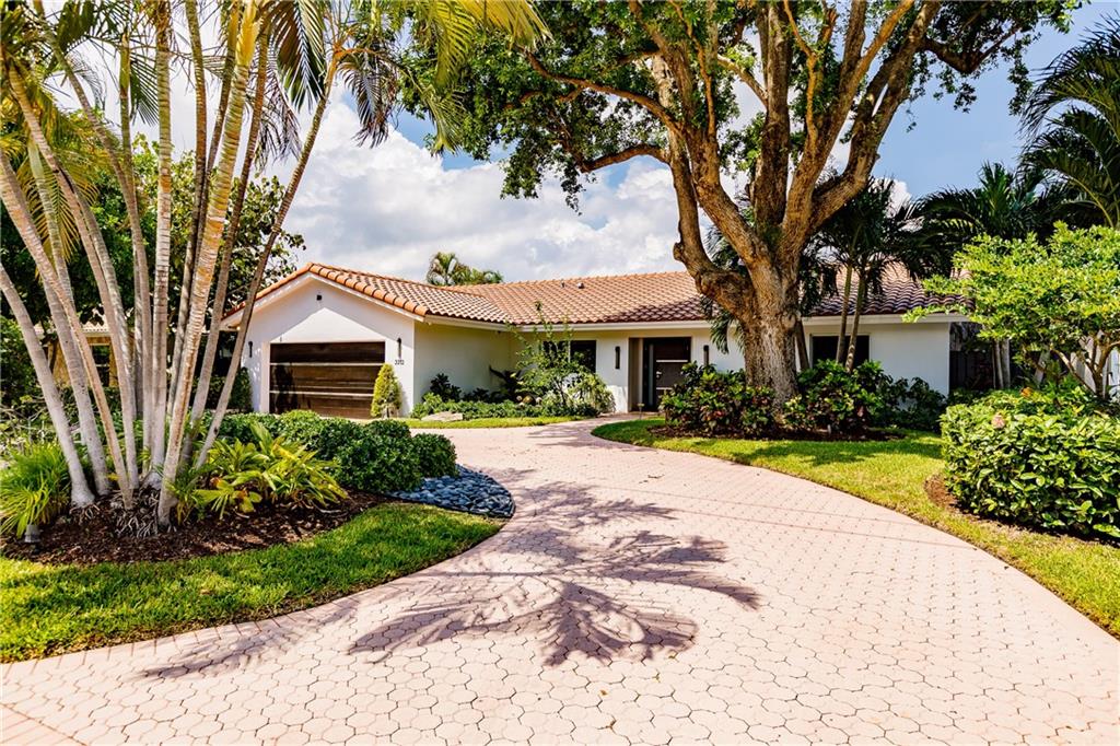 The neighbors don't want you to know about this gem! Sublimely positioned in the quiet gated Community of Bermuda Riviera lies this tranquil sanctuary.  Highlighting high-end updates and premium materials throughout, you will immediately sense the quality of this home.  Featuring 3 bedrooms and 2 ½ bathrooms. European Miele appliances in a kitchen that will be the envy of your guests.  Expansive views to the North, across pool and waterway.  An oasis pool area with outdoor BBQ rounds it all off.  A Boatlift on 80 feet of canal frontage, with no fixed bridges to the ocean. Double garage includes a Tesla charging station. A home automation system shows off this home’s 21st century touches.  Come visit, you'll come away sold!