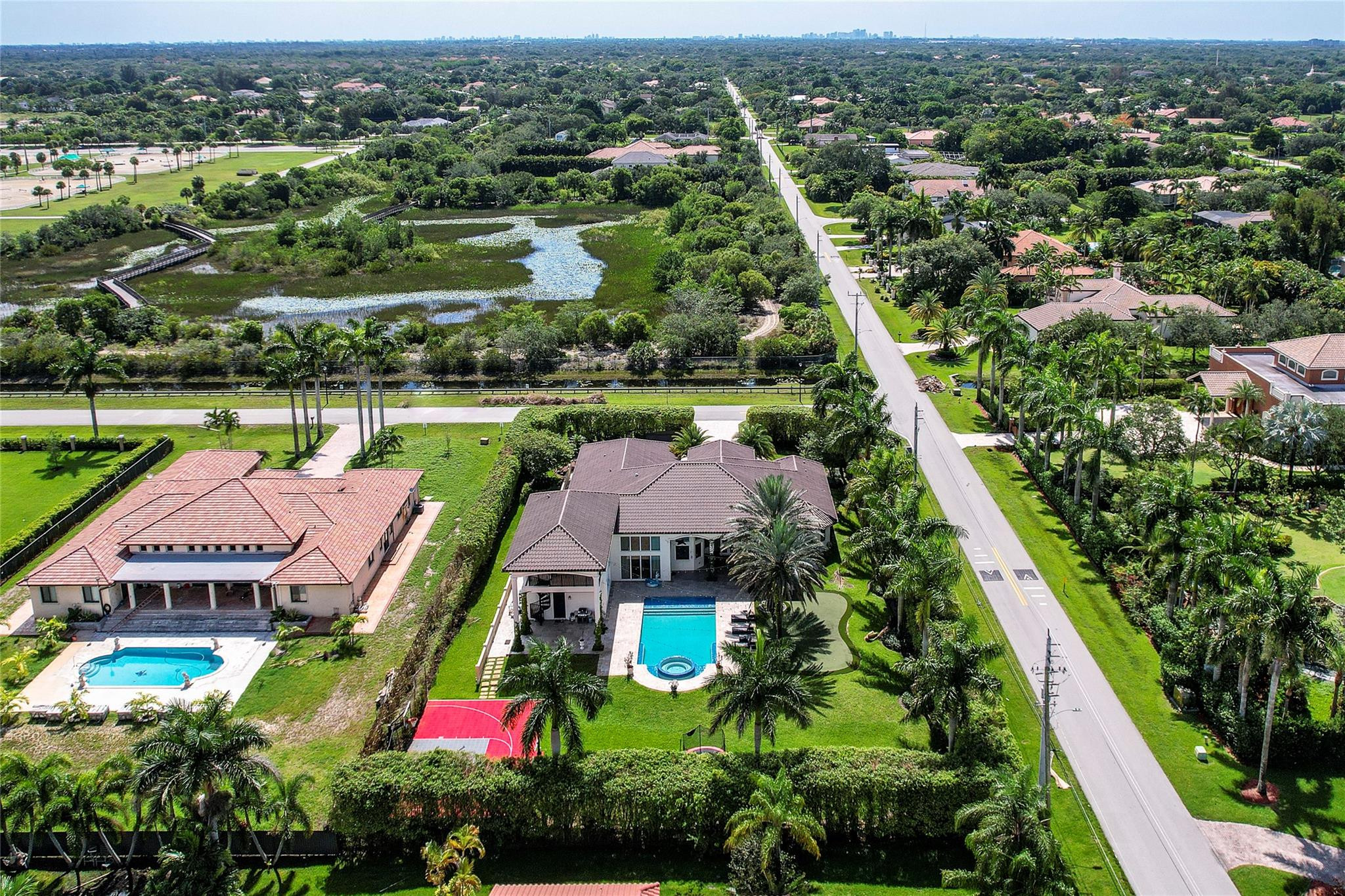 One of a kind Estate in Plantation, FL! This beautiful home is the definition of luxury featuring 5 bedrooms 5 baths and a complete in law suite.  As you walk into this home you can't help but notice the beautiful mother of pearl accent wall, top of the line finishings starring designer brands such as FENDi, unbelievable kitchen with high end appliances such as Wolf and SubZero, High ceilings, and an amazing movie theater. The outdoors is an amazing space perfect for having friends over featuring a putting and chipping green, pool , jacuzzi and basketball court.  This gorgeous home is being offered with furnitures and perfect move in ready condition. You do not want to miss this amazing property. Come Schedule a tour today!