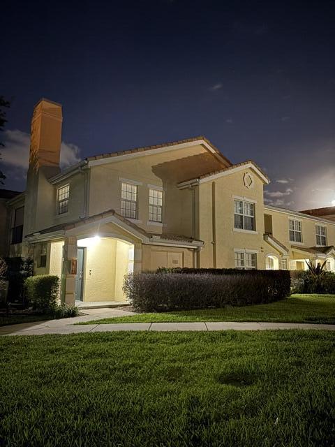 Move-in ready and beautifully updated 2 bedroom, 2 bath end-unit in the heart of St. Lucie West! This light-filled home features two spacious primary suites.  Upgrades include impact windows, newer A/C, new water  heater, stainless steel appliances, granite countertops in both kitchen and baths. Enjoy abundant closet space and relax on the screened covered patio. Located in a gated community with resort-style amenities including a beautiful clubhouse, heated pool, gym, jacuzzi, tennis and playground. Close to I-95, Turnpike, Clover Park (Mets Stadium), shopping, dining  and everything Tradition has to offer. Don't miss this opportunity to own a stylish, low maintenance home in one of Port St. Lucie's most convenient locations!