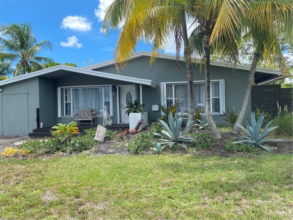 "There's No Place Like Home" In Oakland Park located between Miami and Palm Beach, close to 95 and Wilton Manors with a short distance to Lauderdale By The Sea Fishing Pier and the Beach. This spacious 4 Bd/2Bath Pool home is waiting! Pool is salt water ready, Chlorinated now, with an outdoor shower. Totally fenced yard with wraparound deck and room for a Boat AND Home on wheels! Oversized lot 14,000 sq ft. Garage is converted to bedroom with huge closet space. Bright open plan, lots of windows with views of pool from bedrooms. Electric fireplace in LR for those chilly nights! Roof, Pool and Tankless hot water heater 4 years old. Solar panels (28) paid in full, saving approximately  $150/Mo. Accordion hurricane shutters .Old Cast Iron pipes completely re- plumbed this month.