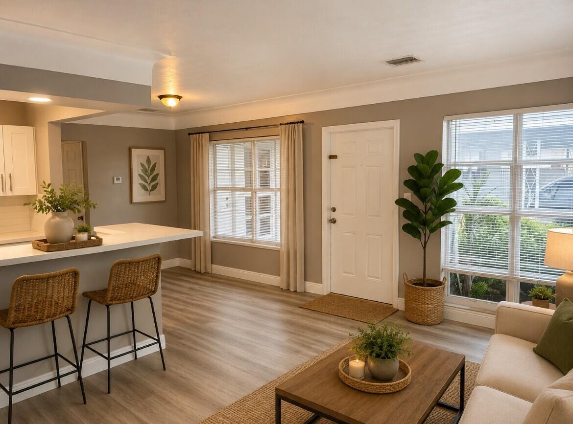 1 MILE FROM THE BEACH!!! IT HAS A PRIVATE BACKYARD. CENTRAL AC SYSTEM! WASHER AND DRYER, WATER PROOF LAMINATE FLOORS. REMODELED BATHROOM AND KITCHEN WITH QUARTZ COUNTER TOPS. Close to FTL AIRPORT, Downtown FTL and BEACHES! Pictures virtually staged.