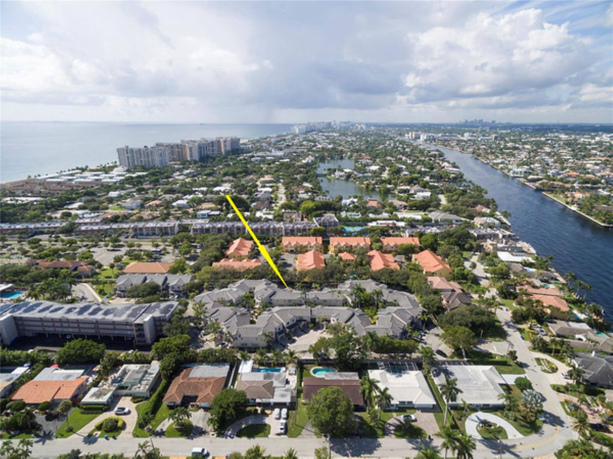 Welcome to Oceanwalk Villas.  This Boutique Complex of just 47 Townhomes is directly across from the Town Beach access and walking distance to the Shops of Sea Ranch Lakes and Downtown Lauderdale by the Sea.  Meticulously Kept Unit offers Tile and Laminate Wood Like flooring Throughout. Updated Hot Water 2020.  Association Roof Replaced in 2020.  Second Floor Laundry, Walk in Closet in Primary Bedroom.  Charming Patio overlooks Landscaped Courtyard with Fountain.  Attached single car garage and space in front of garage included.  Two Car Max Per unit.  Pet Friendly complex that allows two pets and Rentals are ok first year of ownership, but limited to one time per year 90 day min.
